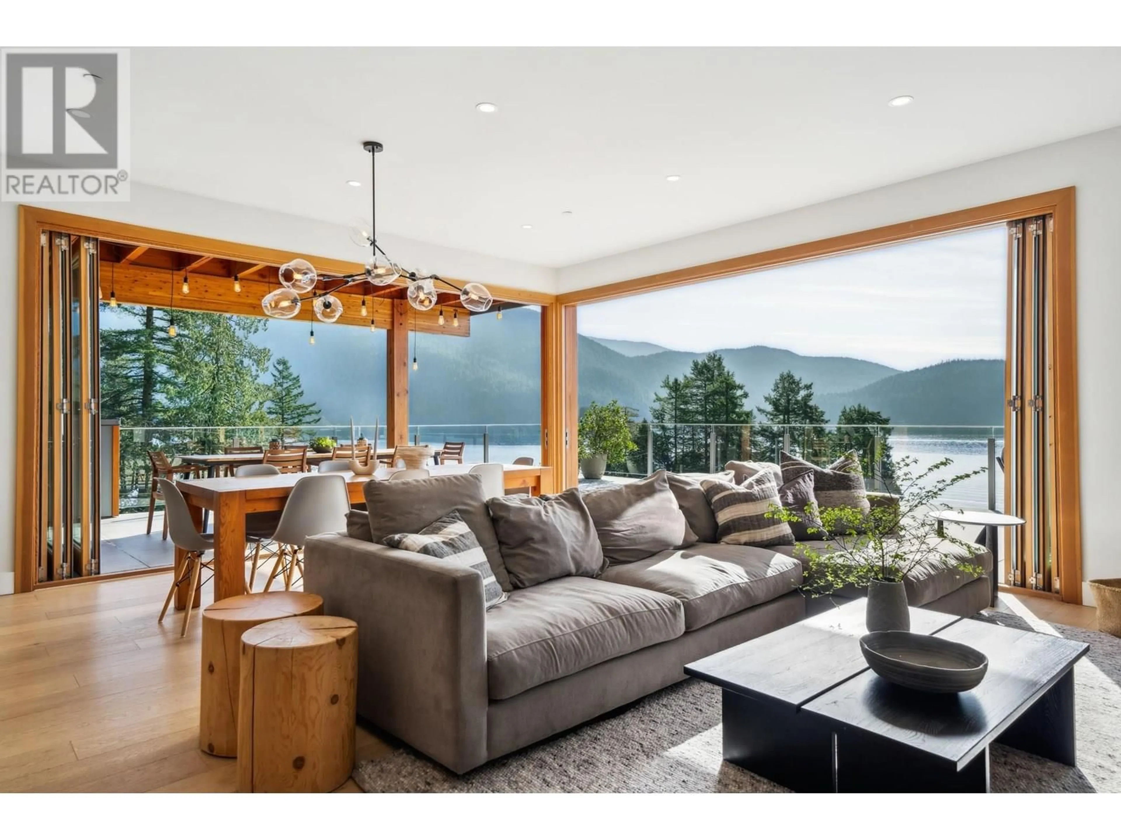 Living room with furniture, wood/laminate floor for 5577 INDIAN RIVER DRIVE, North Vancouver British Columbia V7G2T7