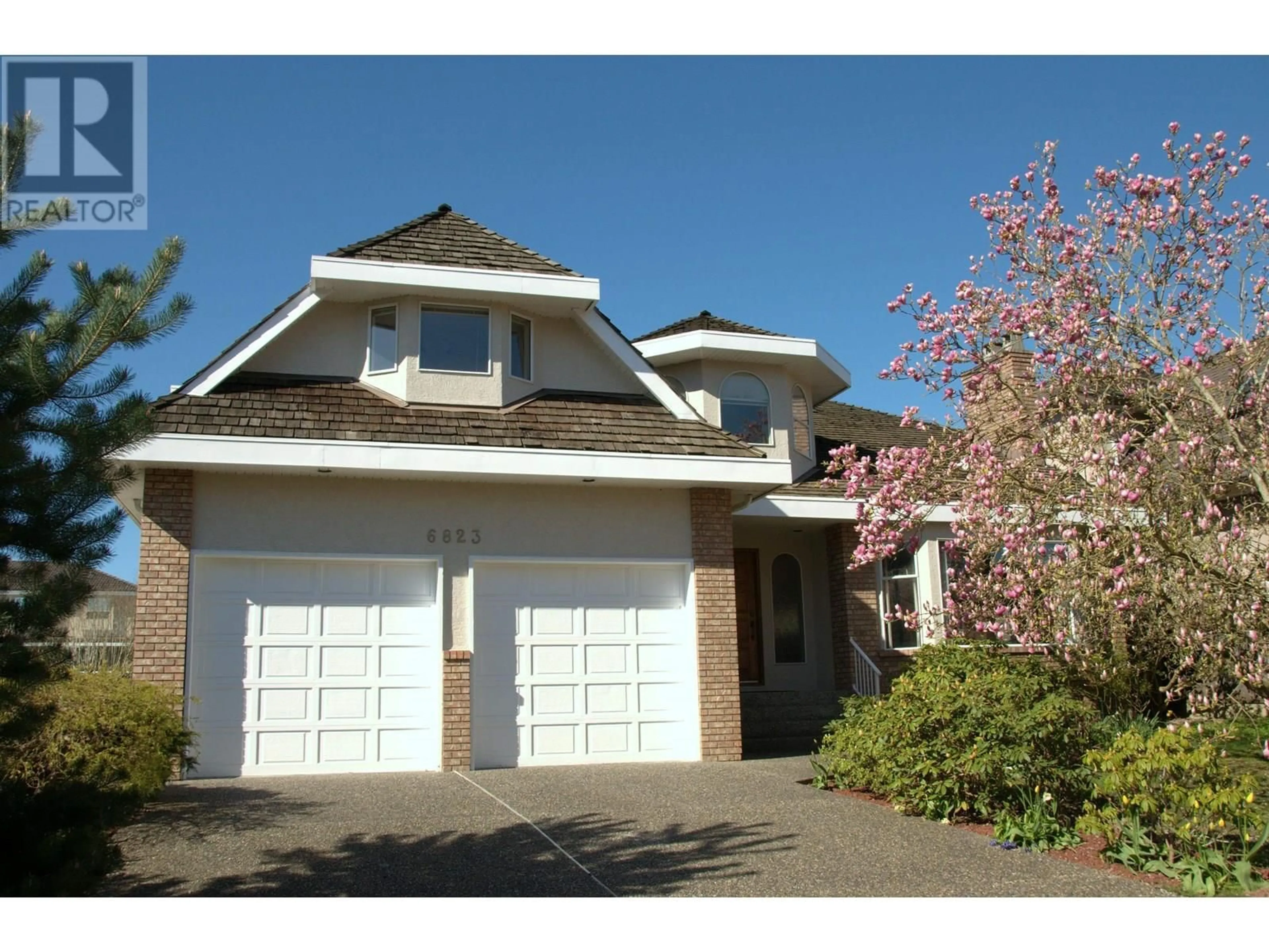 Home with vinyl exterior material, street for 6823 GRANT PLACE, Burnaby British Columbia V5B4X4