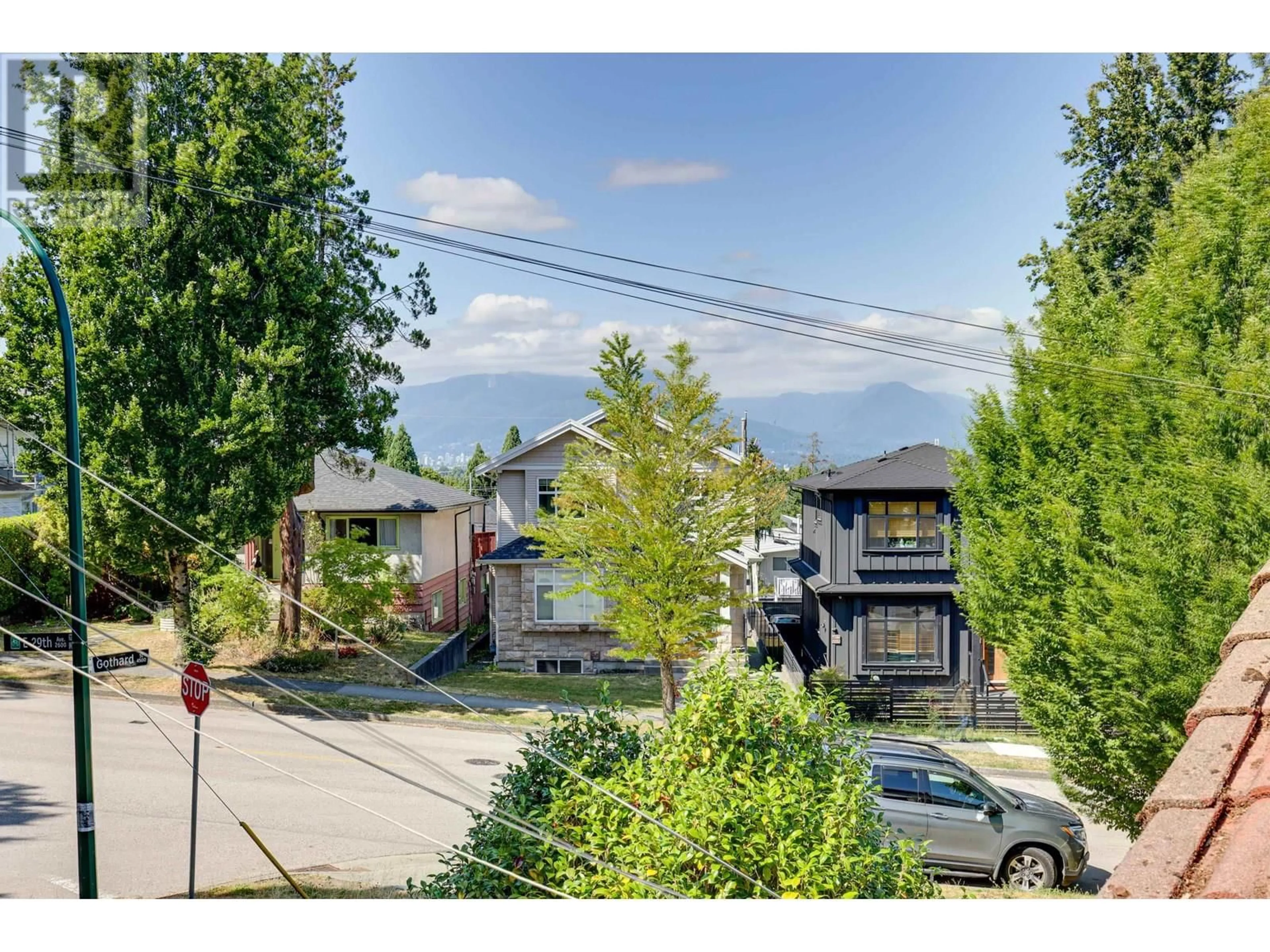 A pic from outside/outdoor area/front of a property/back of a property/a pic from drone, street for 4516 GOTHARD STREET, Vancouver British Columbia V5R3K7