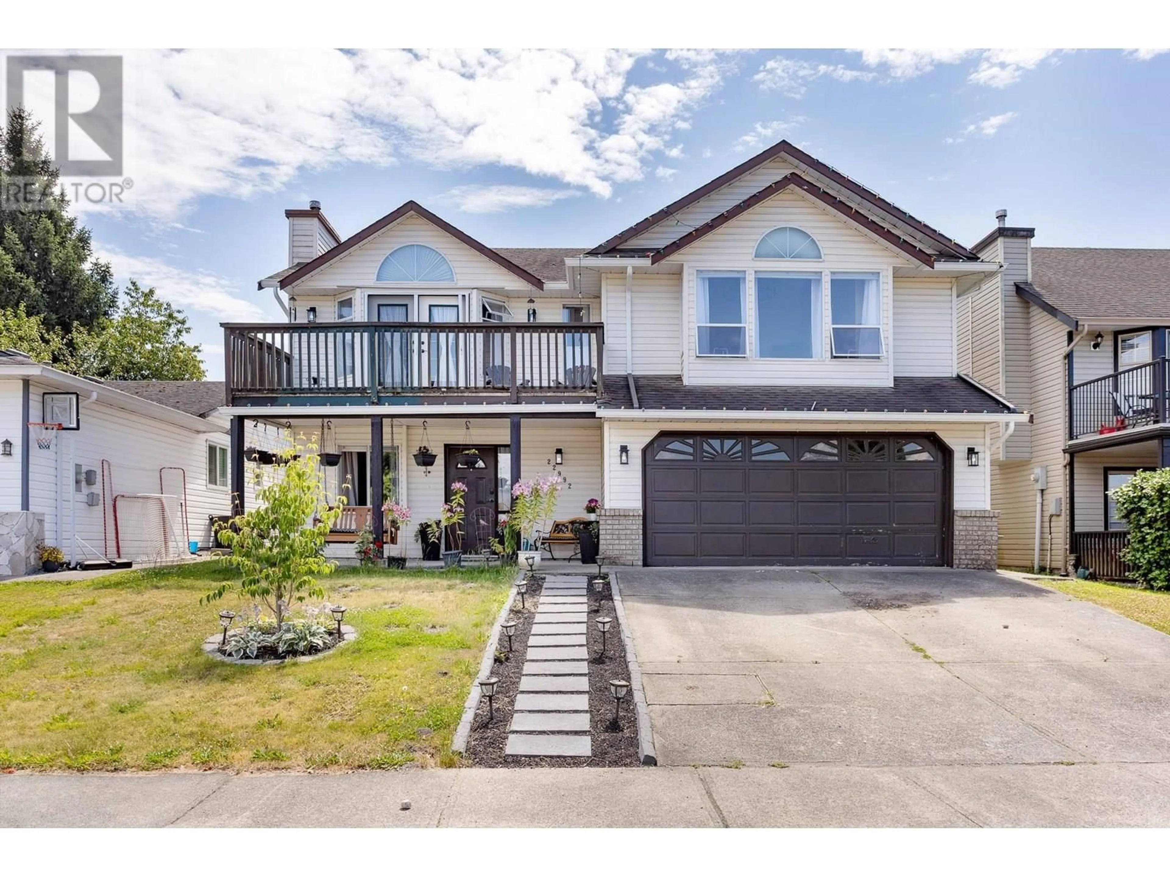 Home with vinyl exterior material, street for 22992 124B AVENUE, Maple Ridge British Columbia V2X0X2