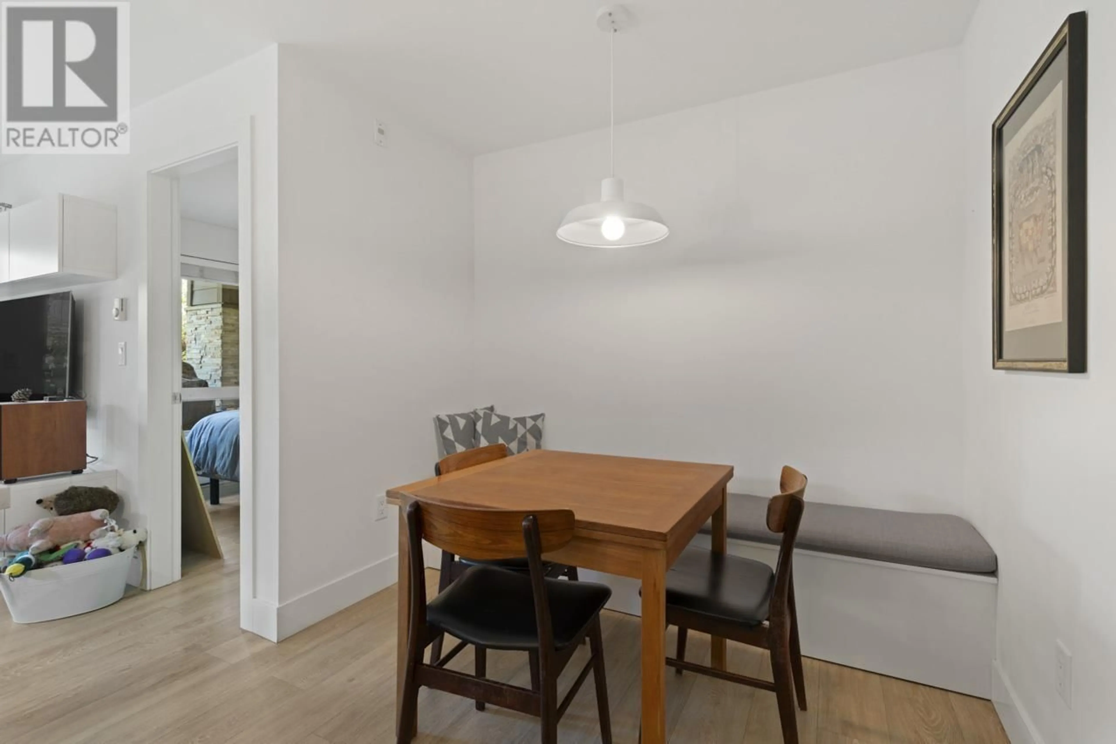 Dining room, wood/laminate floor for 107 - 1661 2ND AVENUE, Vancouver British Columbia V5N1E1