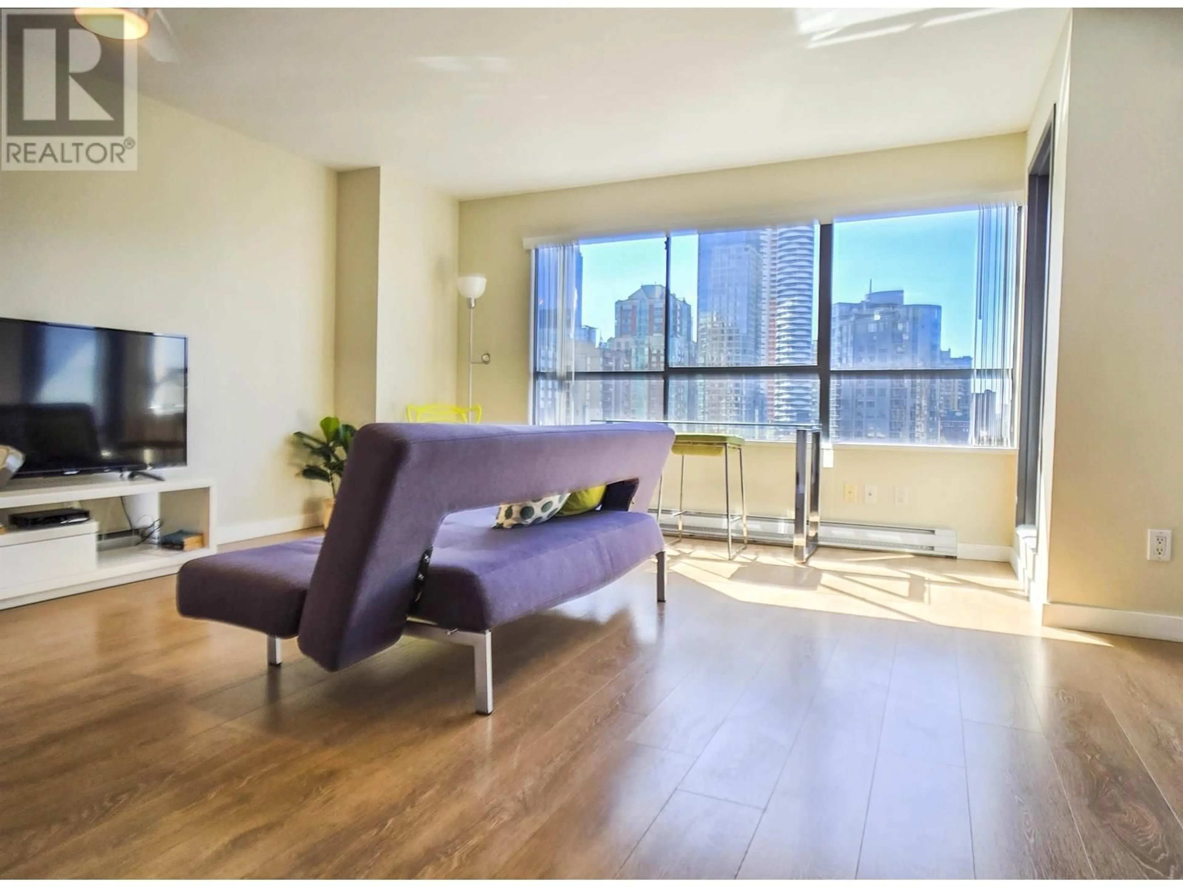 Living room with furniture, wood/laminate floor for 1210 - 1060 ALBERNI STREET, Vancouver British Columbia V6E1A3