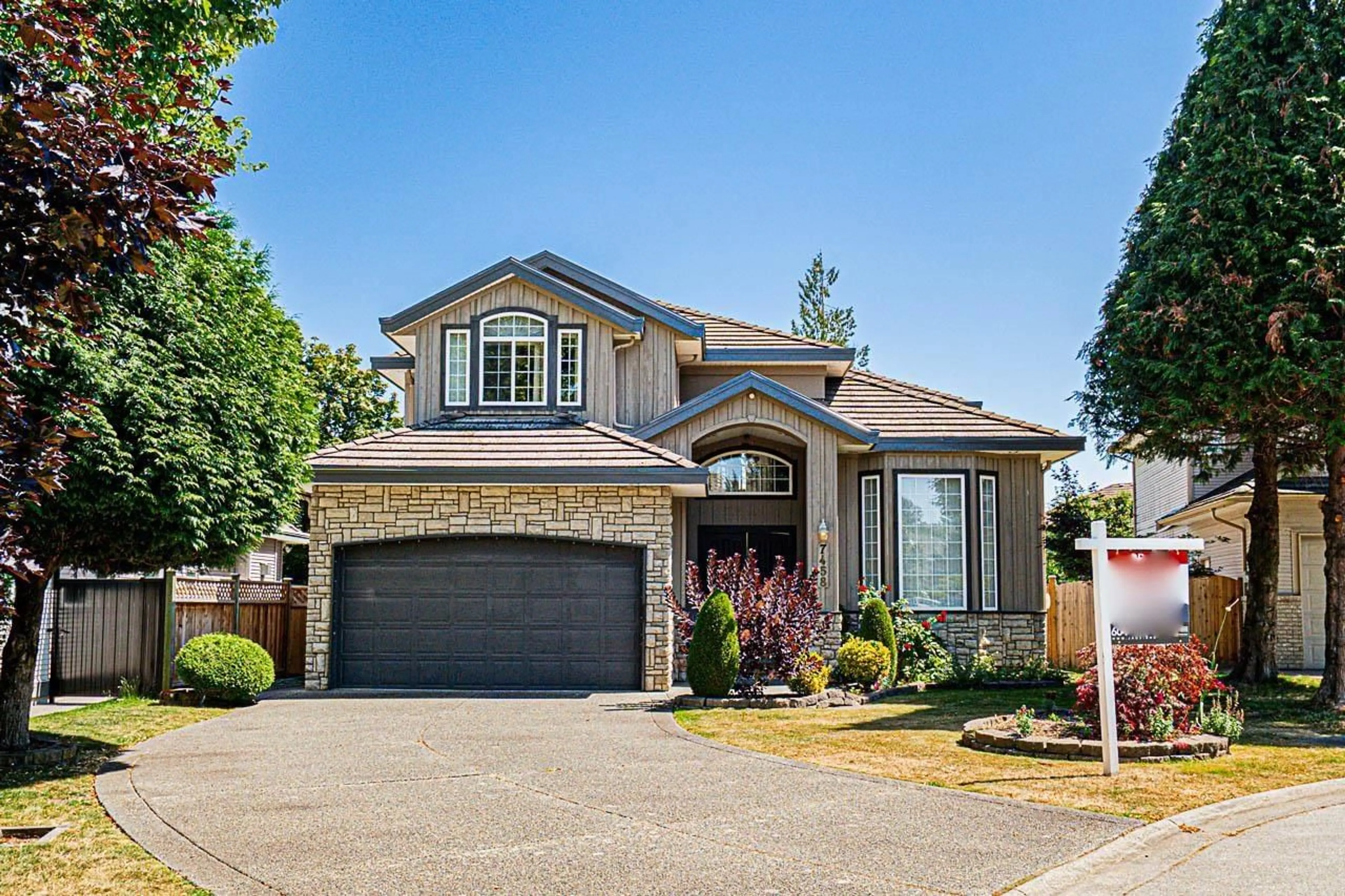 Home with brick exterior material, street for 7458 145A, Surrey British Columbia V3S8Z8