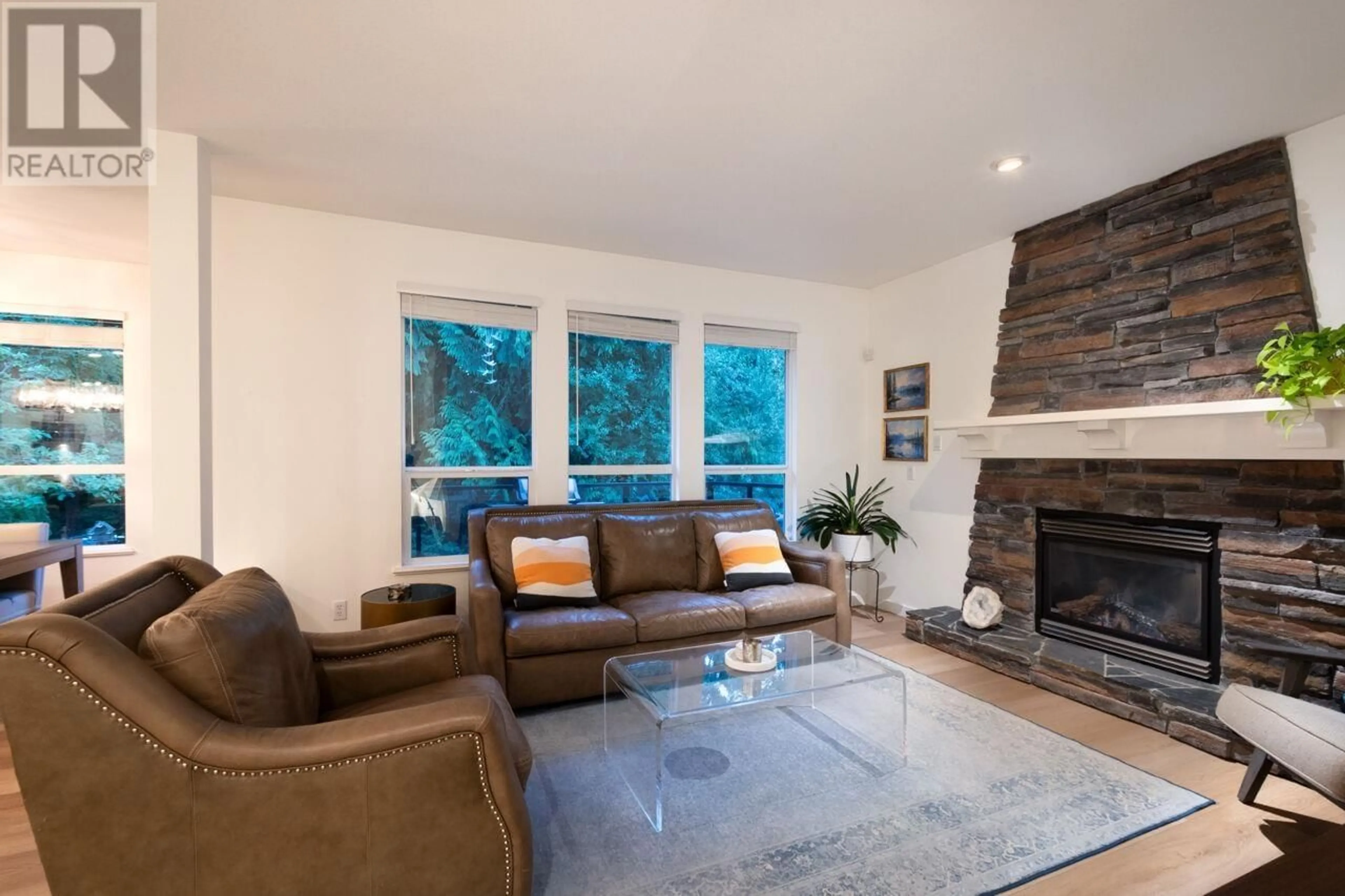 Living room with furniture, wood/laminate floor for 28 ALDER DRIVE, Port Moody British Columbia V3H5M3