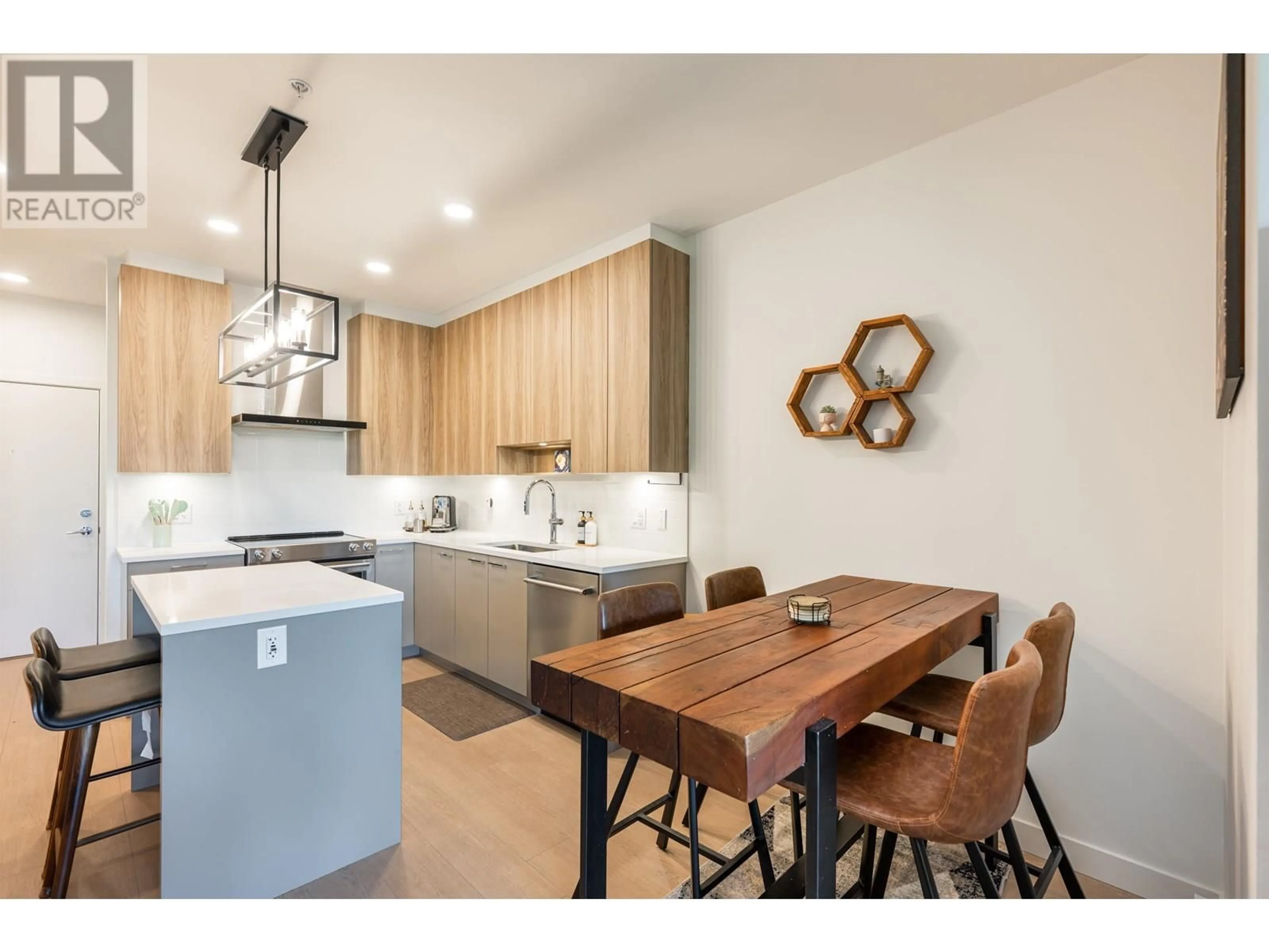 Open concept kitchen, wood/laminate floor for 412 - 7588 16TH STREET, Burnaby British Columbia V3N0H8