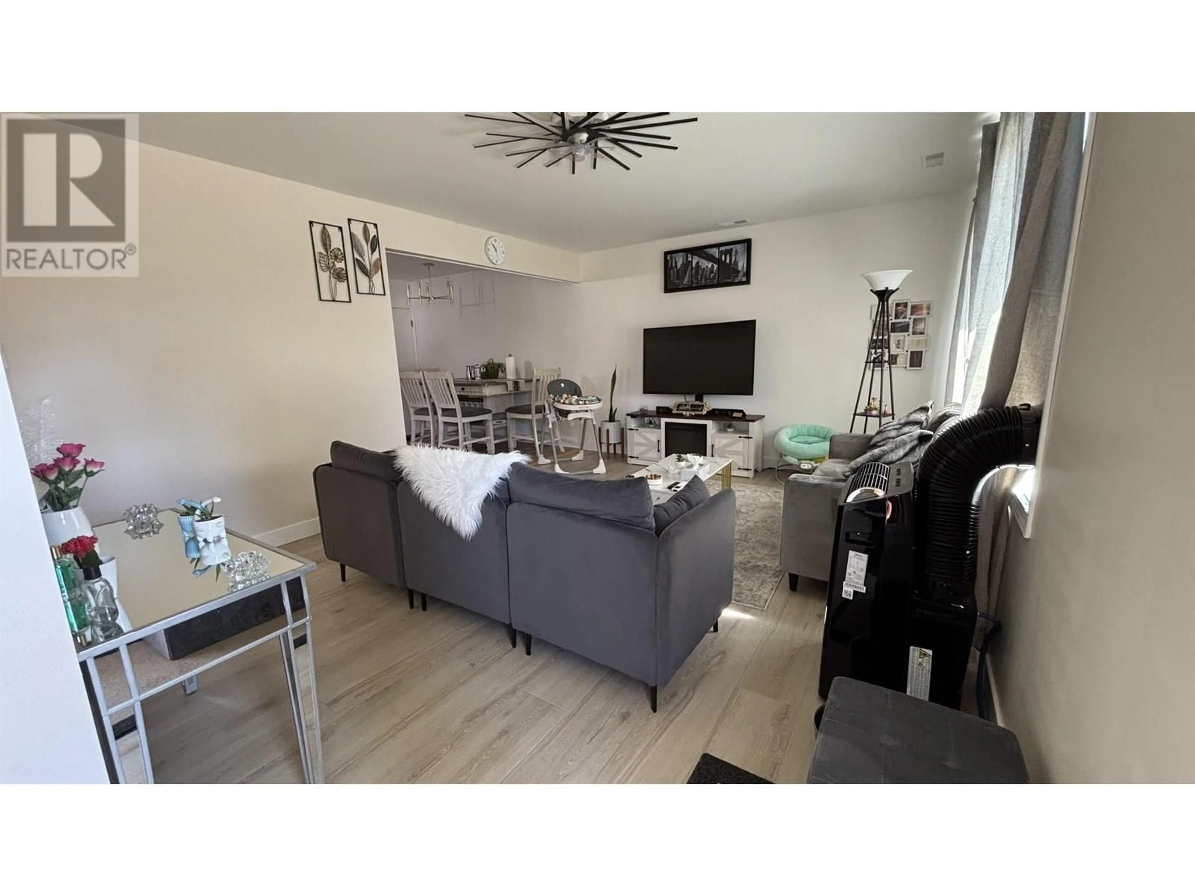 Living room with furniture, wood/laminate floor for 40 OMENICA STREET, Kitimat British Columbia V8C1Z4