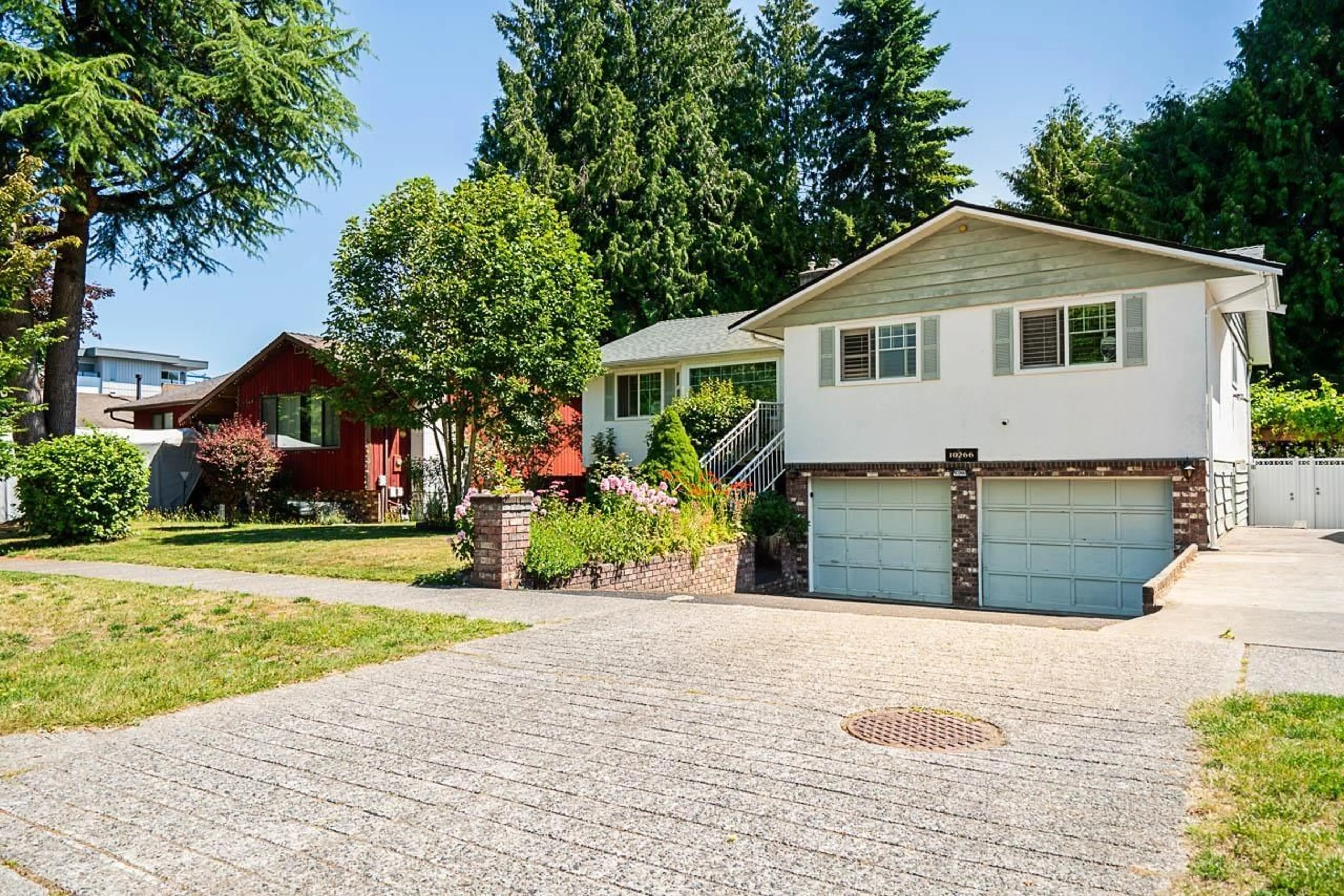 Home with vinyl exterior material, street for 10266 144A, Surrey British Columbia V3R3P8