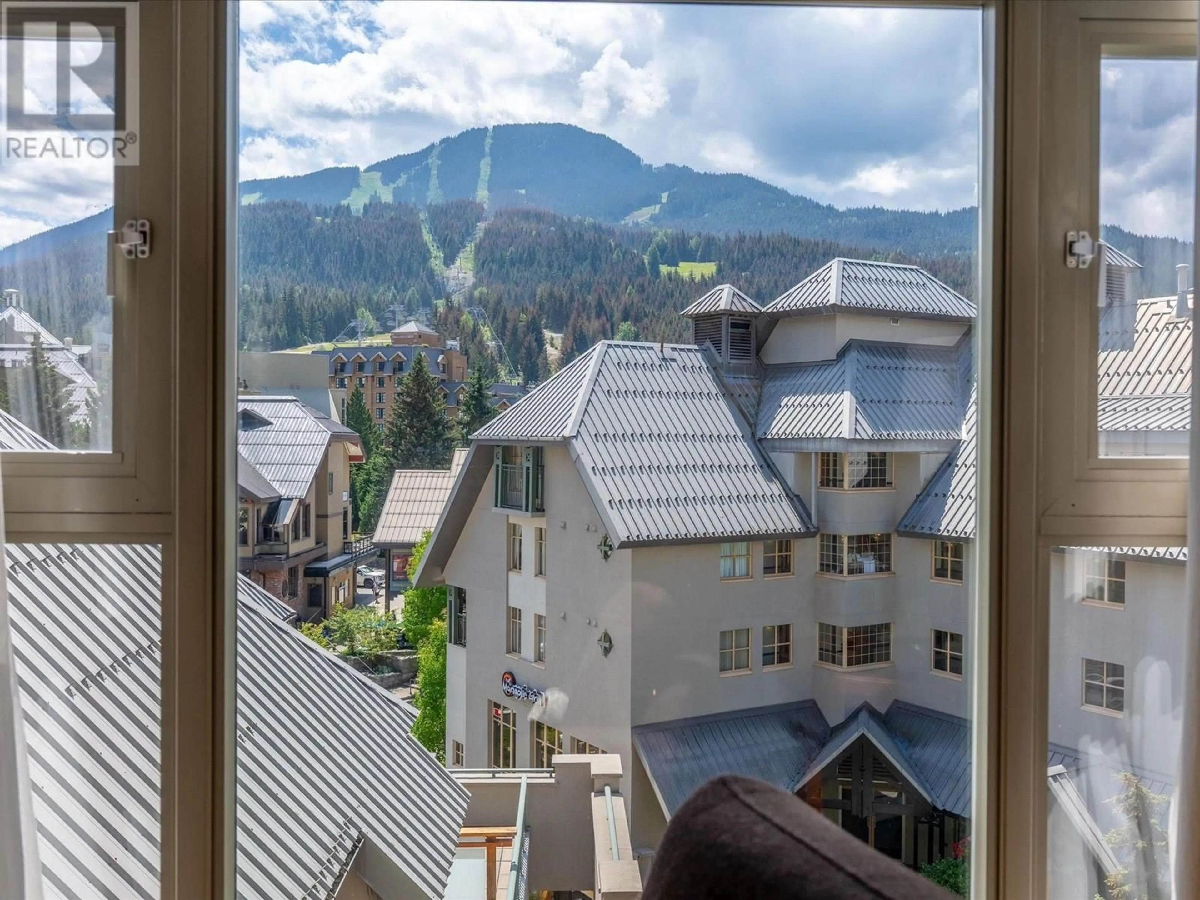 Balcony in the apartment, city buildings view from balcony for 6603 - 4299 BLACKCOMB WAY, Whistler British Columbia V8E0X3