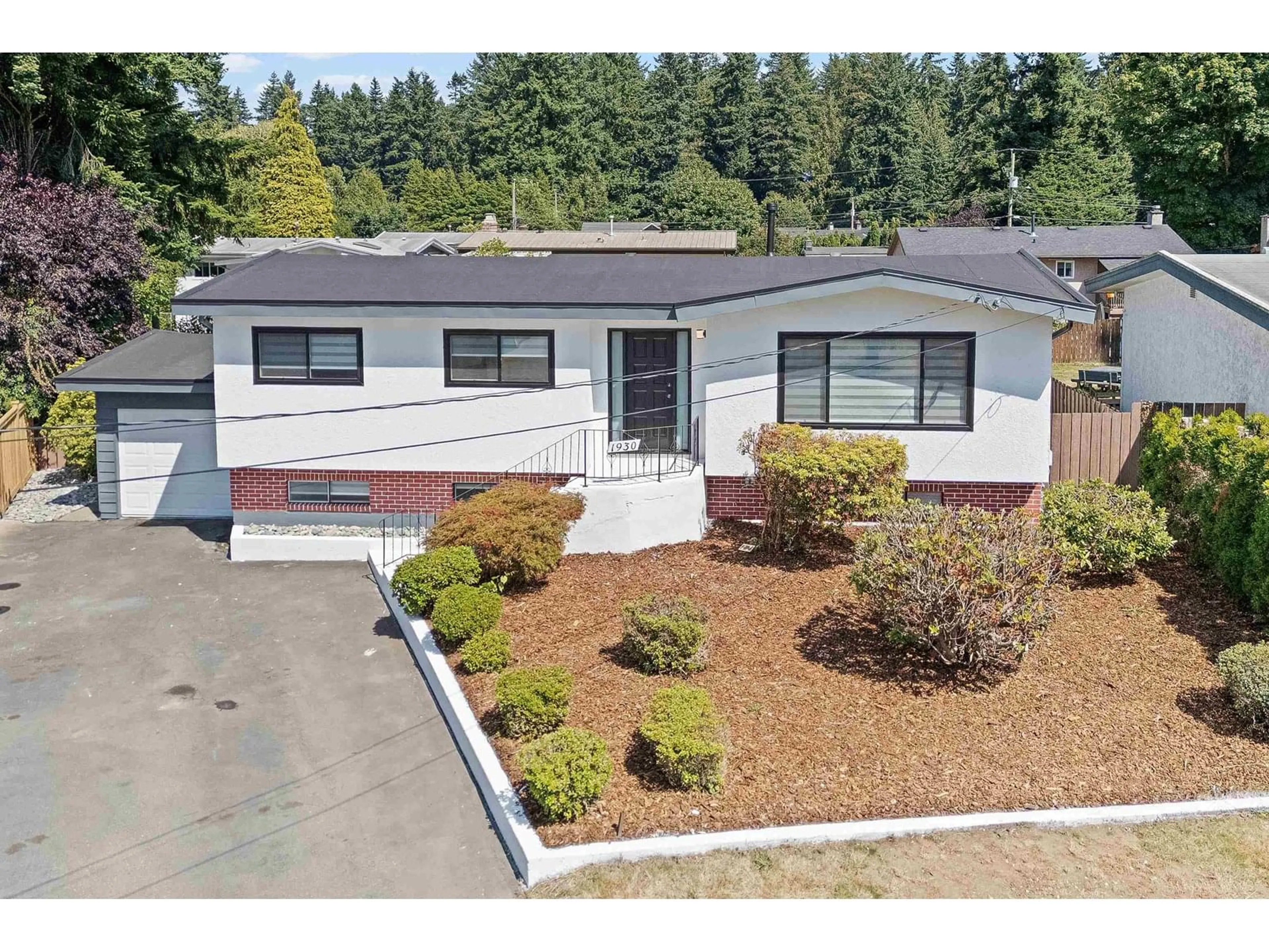 Home with vinyl exterior material, street for 1930 WESTBURY, Abbotsford British Columbia V2S1C1