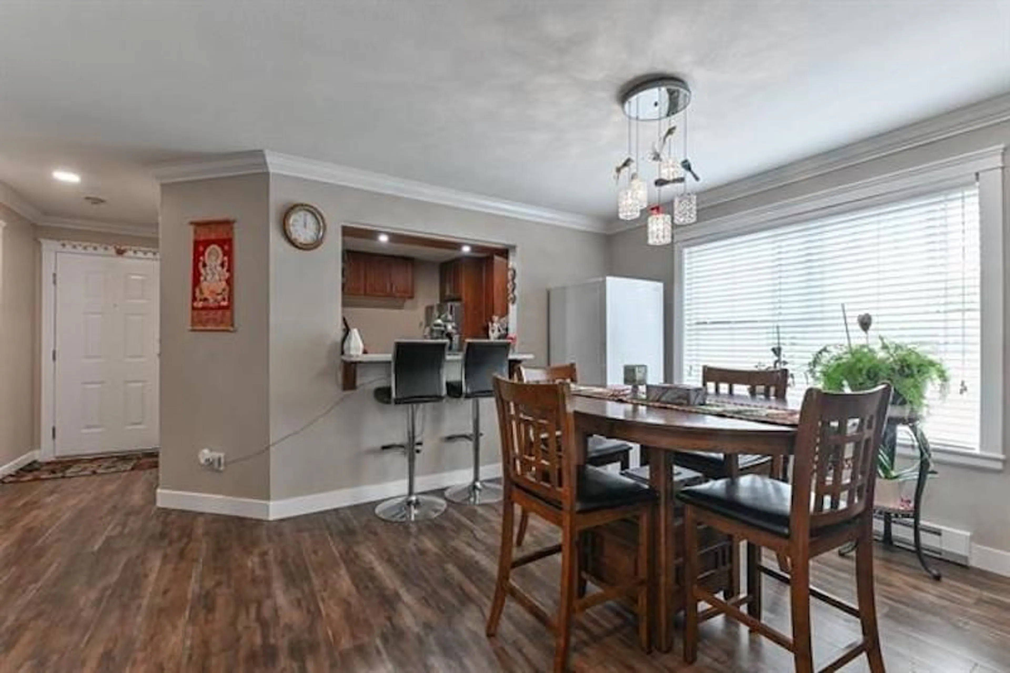 Open concept kitchen, wood/laminate floor for 103 - 12633 72, Surrey British Columbia V3W0A4
