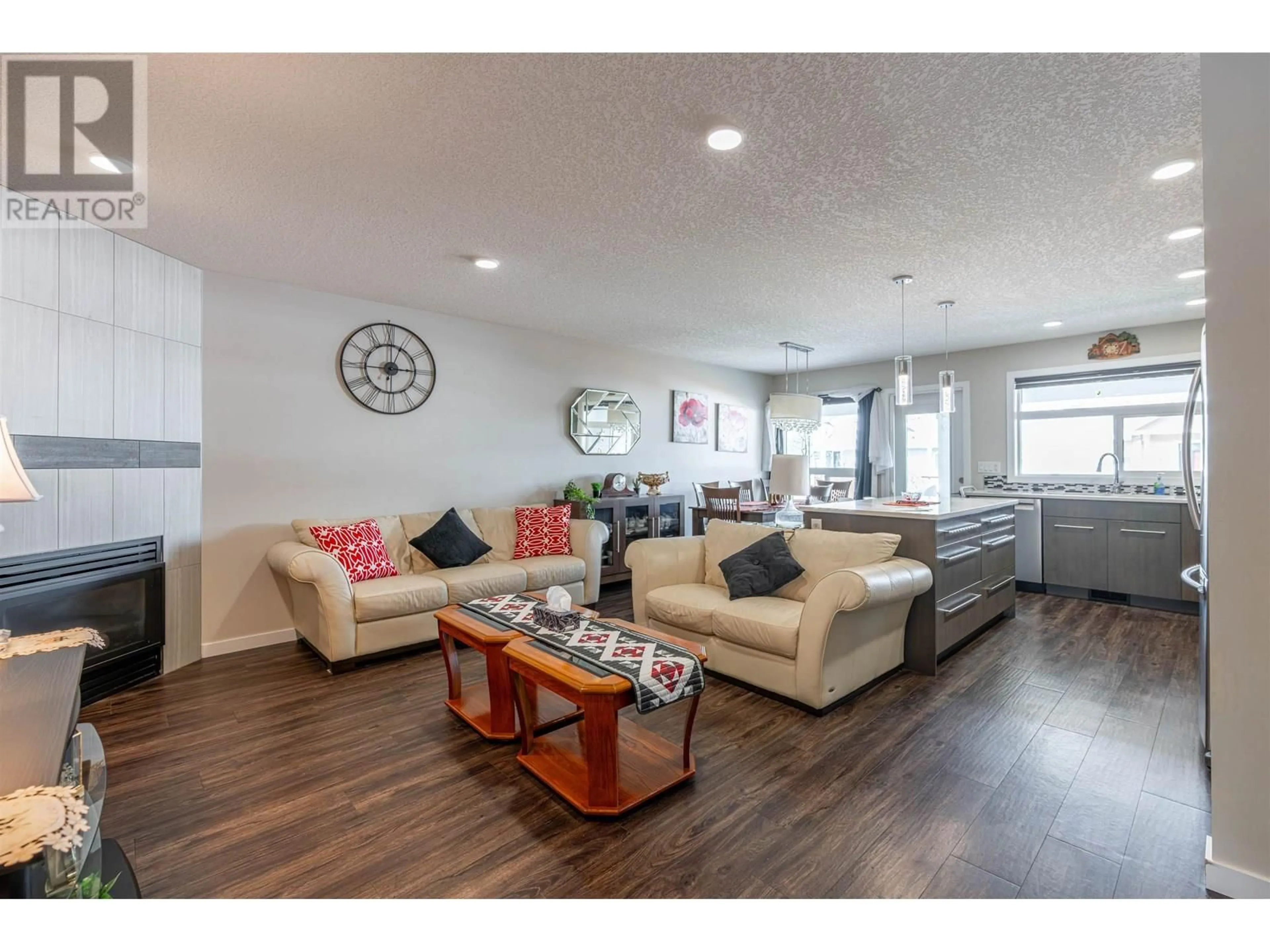 Living room with furniture, wood/laminate floor for 125 - 4303 UNIVERSITY HEIGHTS DRIVE, Prince George British Columbia V2N0E6