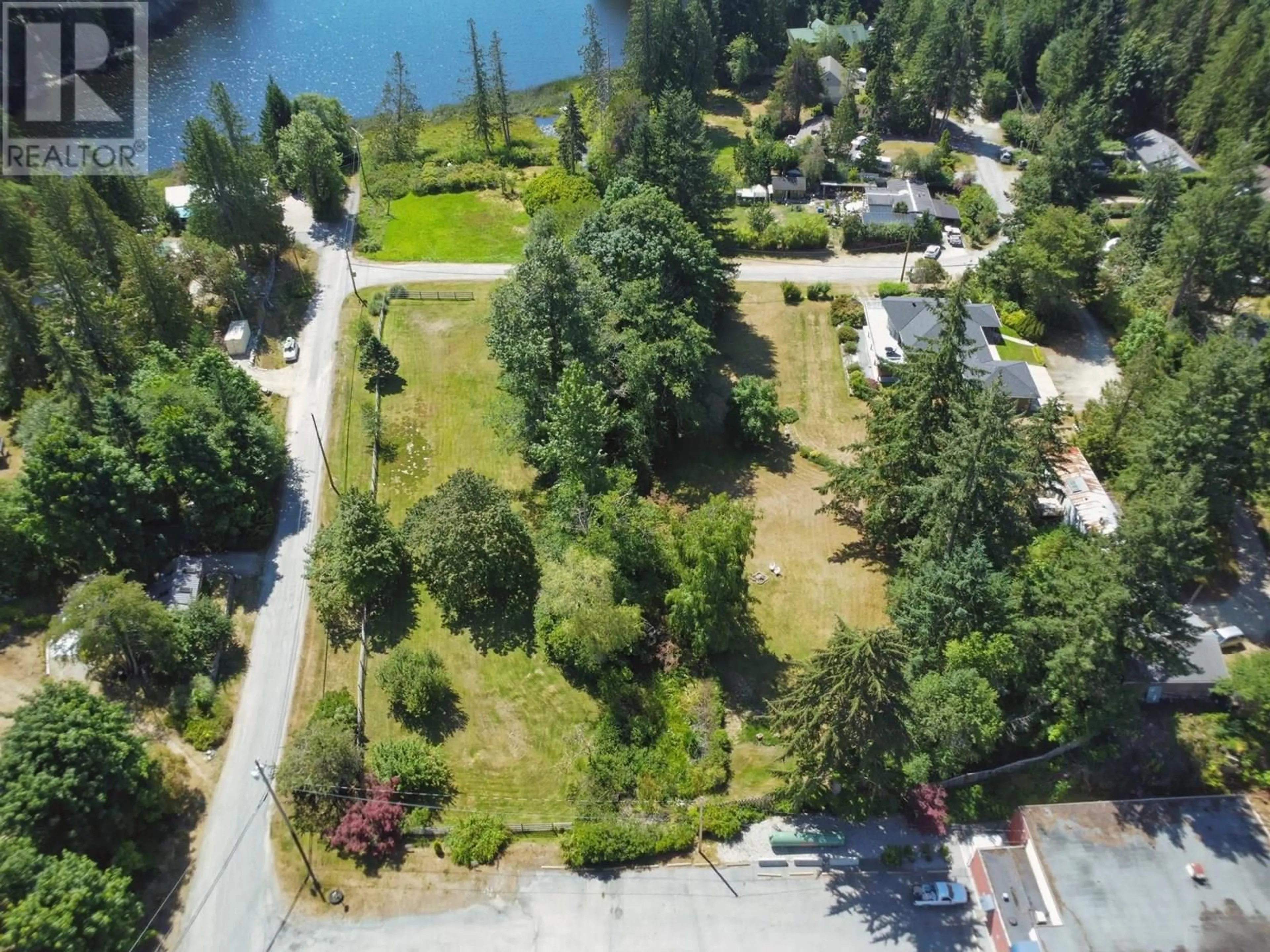 A pic from outside/outdoor area/front of a property/back of a property/a pic from drone, water/lake/river/ocean view for 12810 MAINSAIL ROAD, Madeira Park British Columbia V0N2H1