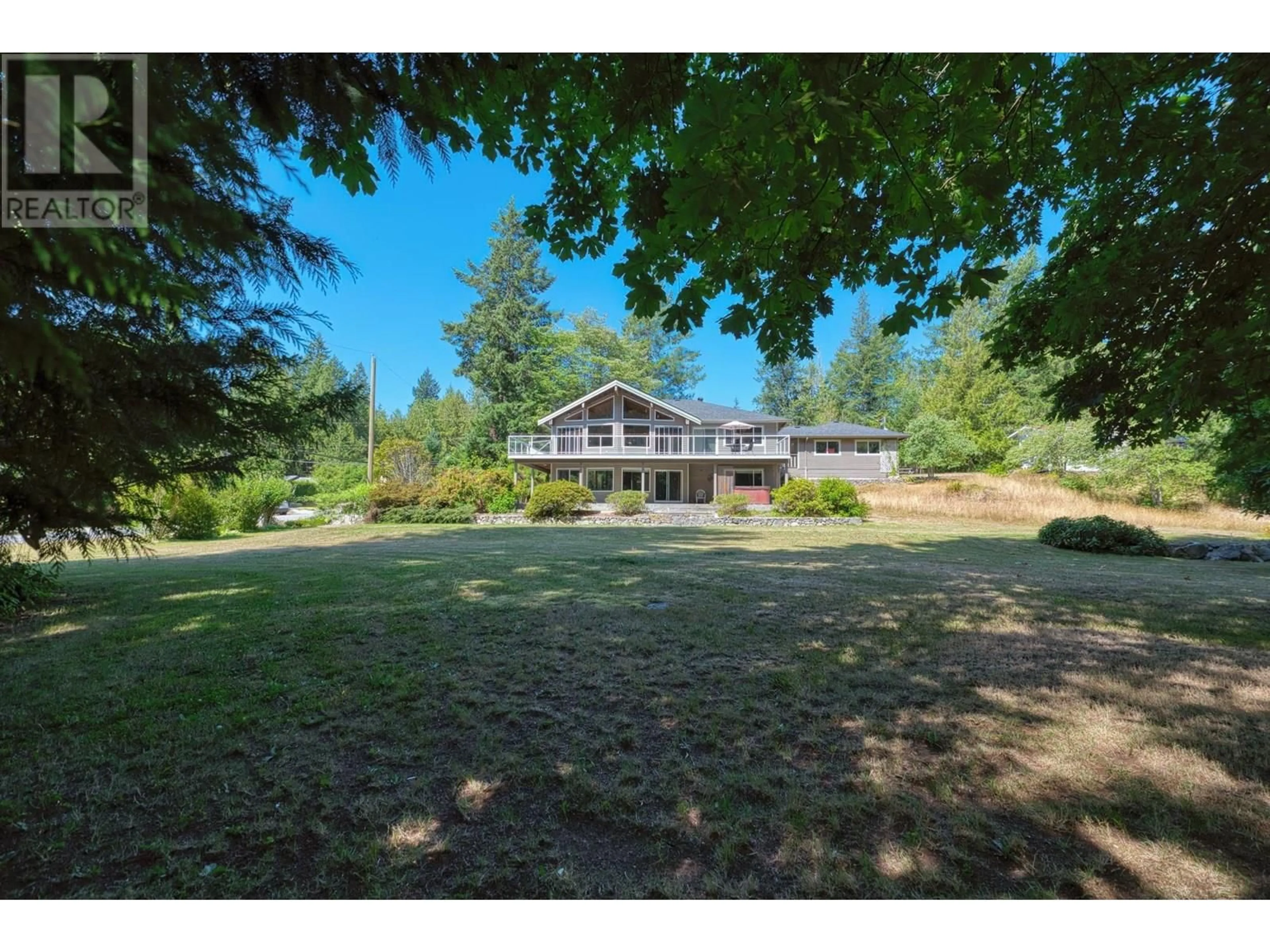 A pic from outside/outdoor area/front of a property/back of a property/a pic from drone, water/lake/river/ocean view for 12810 MAINSAIL ROAD, Madeira Park British Columbia V0N2H1