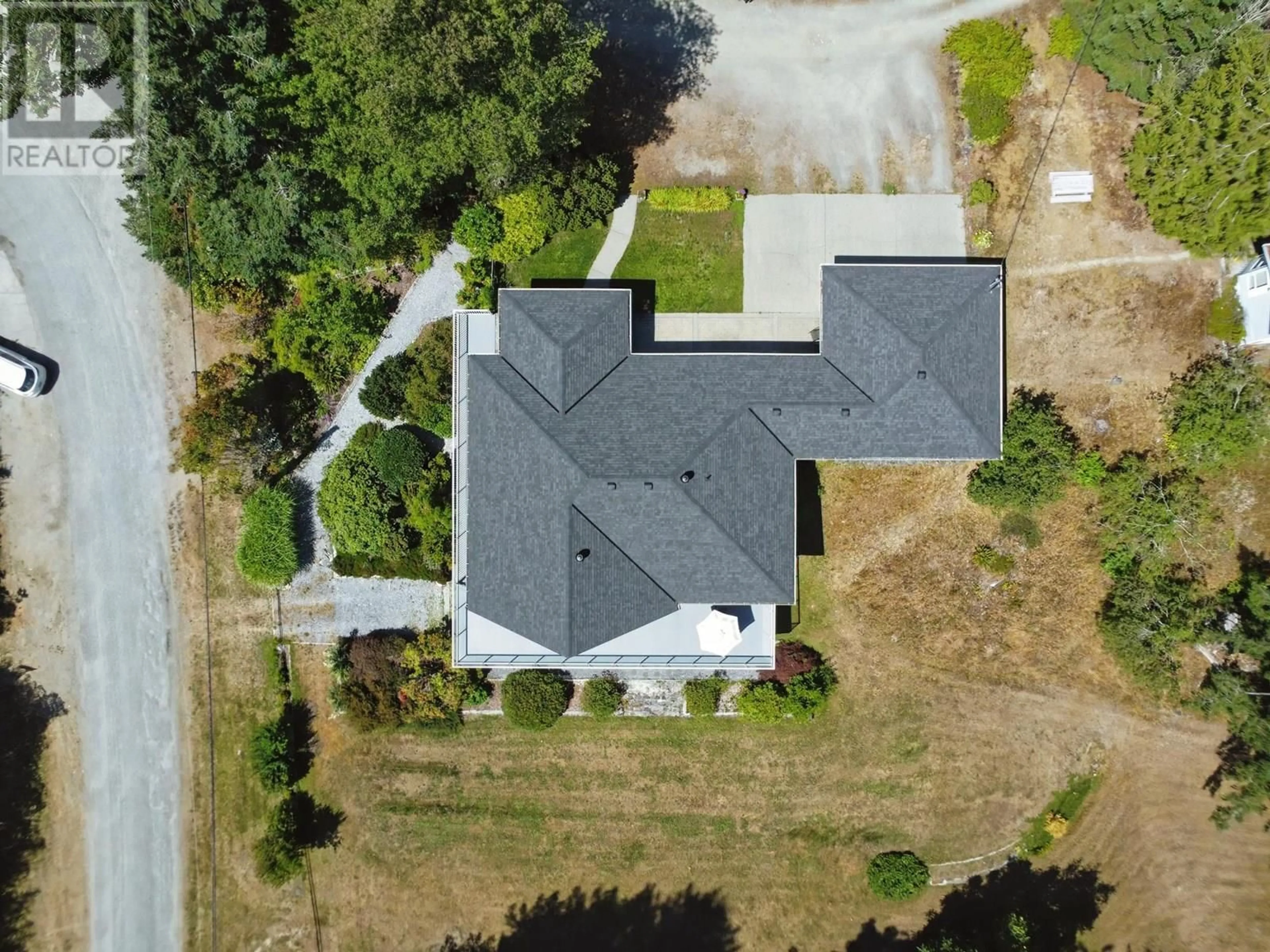 A pic from outside/outdoor area/front of a property/back of a property/a pic from drone, street for 12810 MAINSAIL ROAD, Madeira Park British Columbia V0N2H1