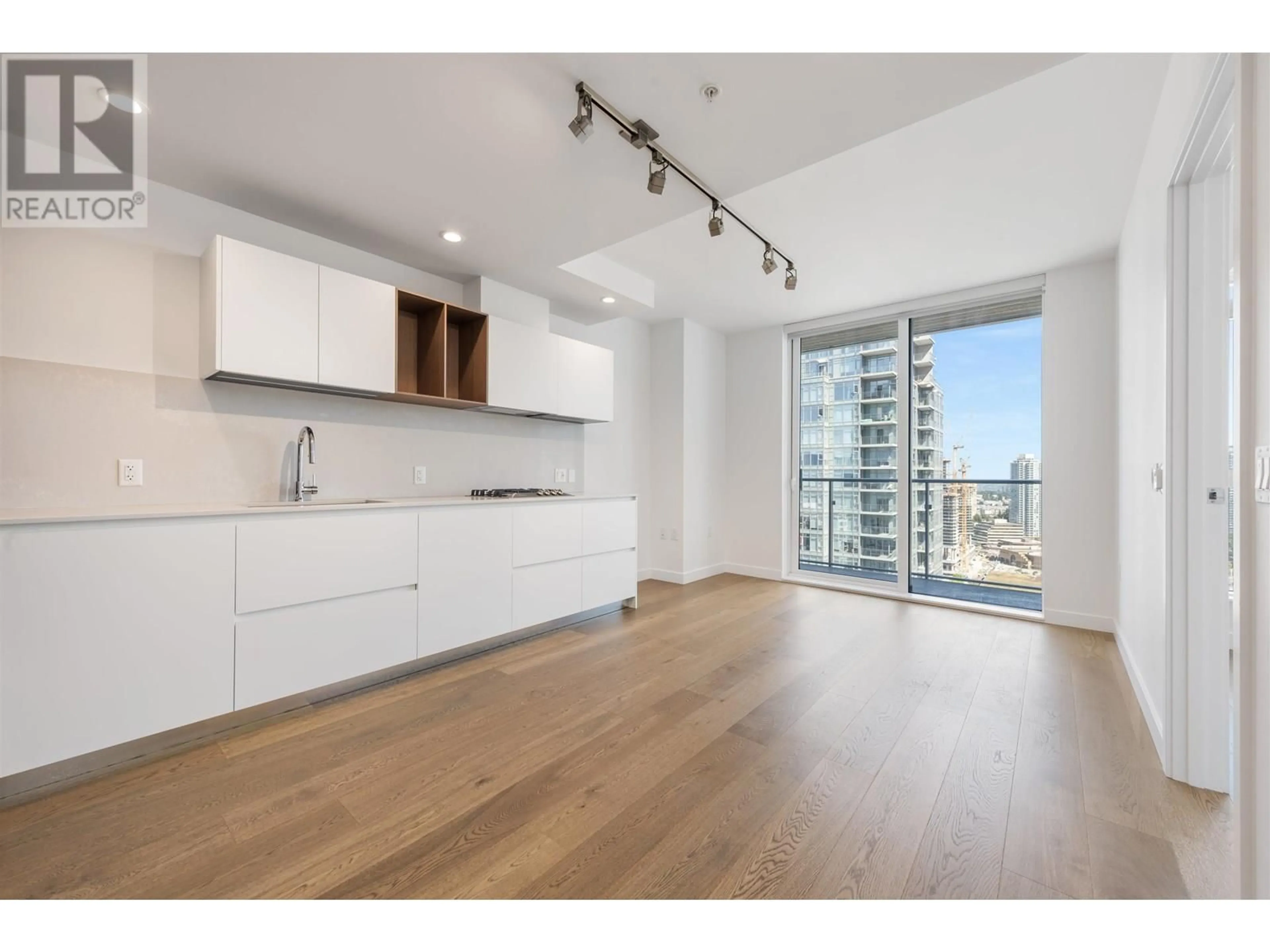Open concept kitchen, wood/laminate floor for 2801 - 6000 MCKAY AVENUE, Burnaby British Columbia V5H0K2