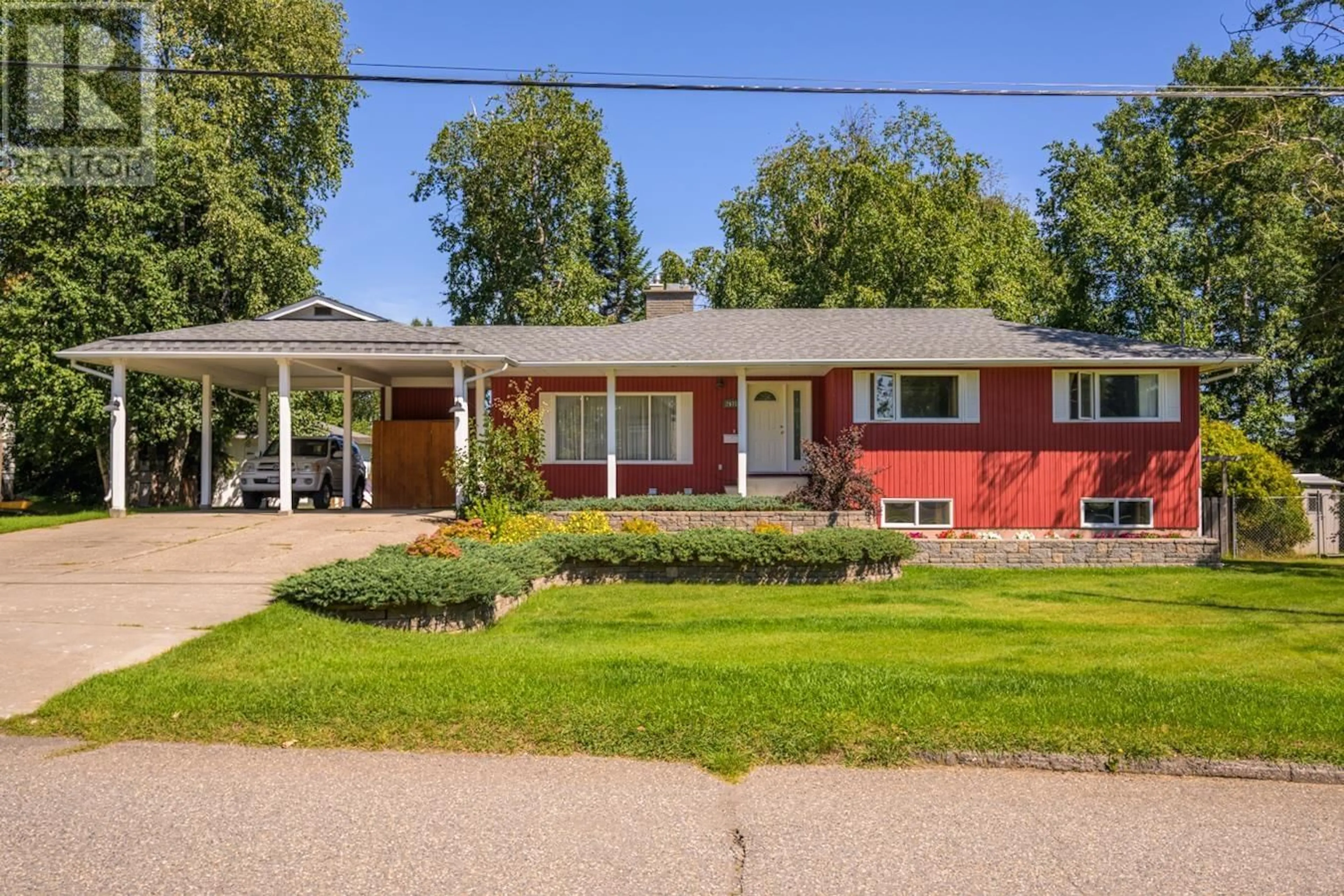 Home with brick exterior material, street for 2678 STARLANE DRIVE, Prince George British Columbia V2N5L6