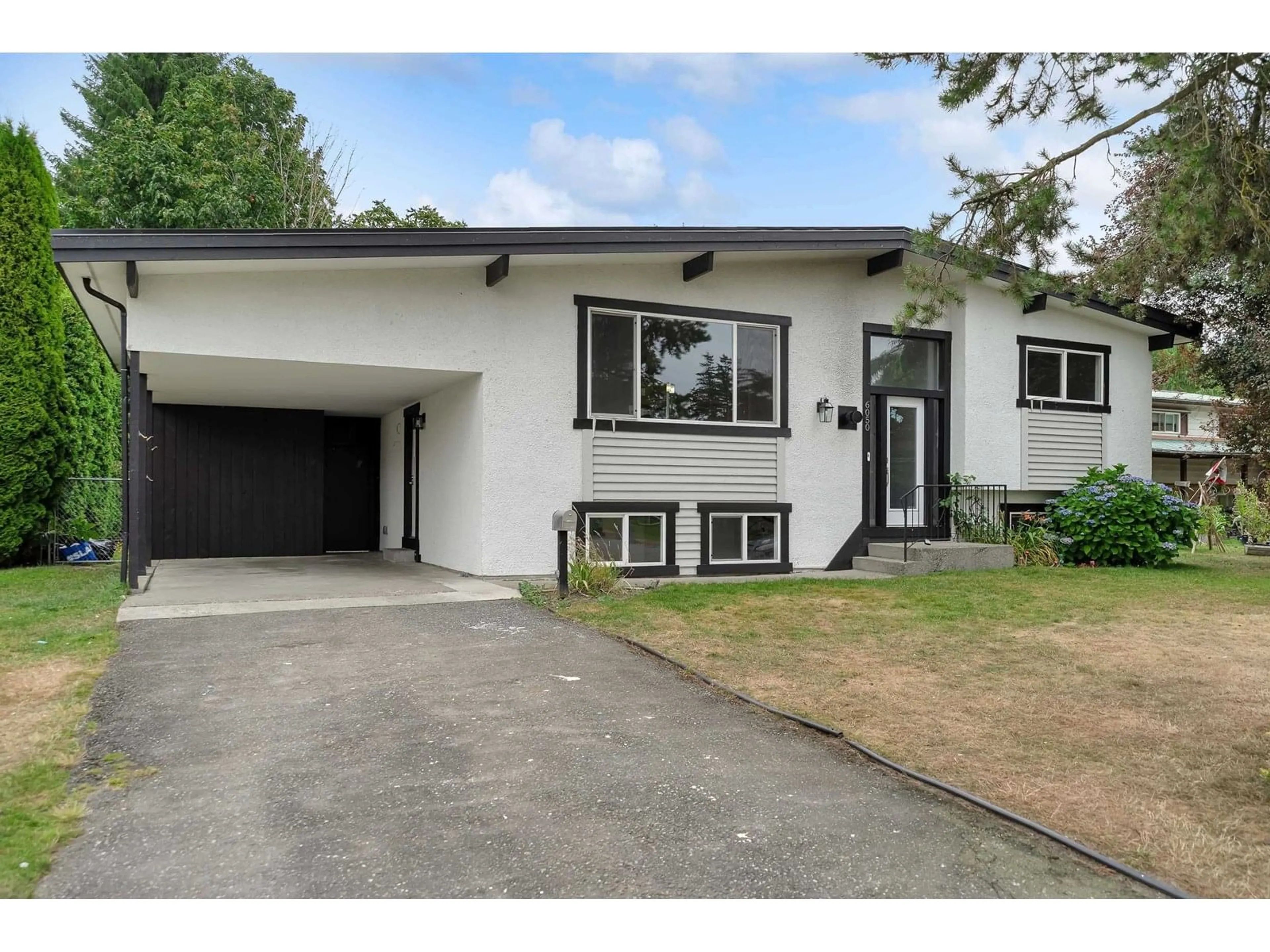 Home with vinyl exterior material, street for 6050 GLENMORE DRIVE, Chilliwack British Columbia V2R2H5