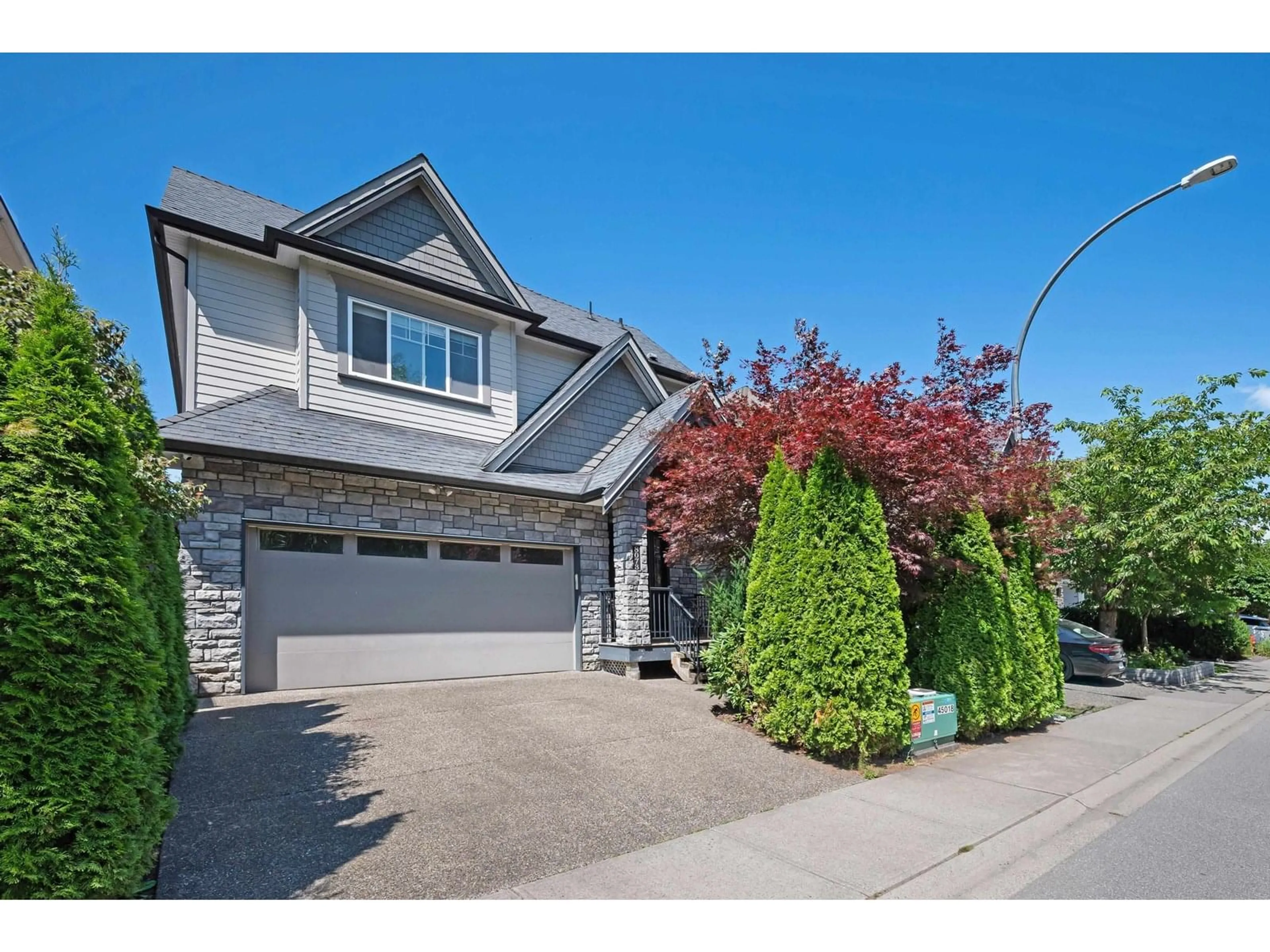 Home with vinyl exterior material, street for 8073 212, Langley British Columbia V2Y0E8