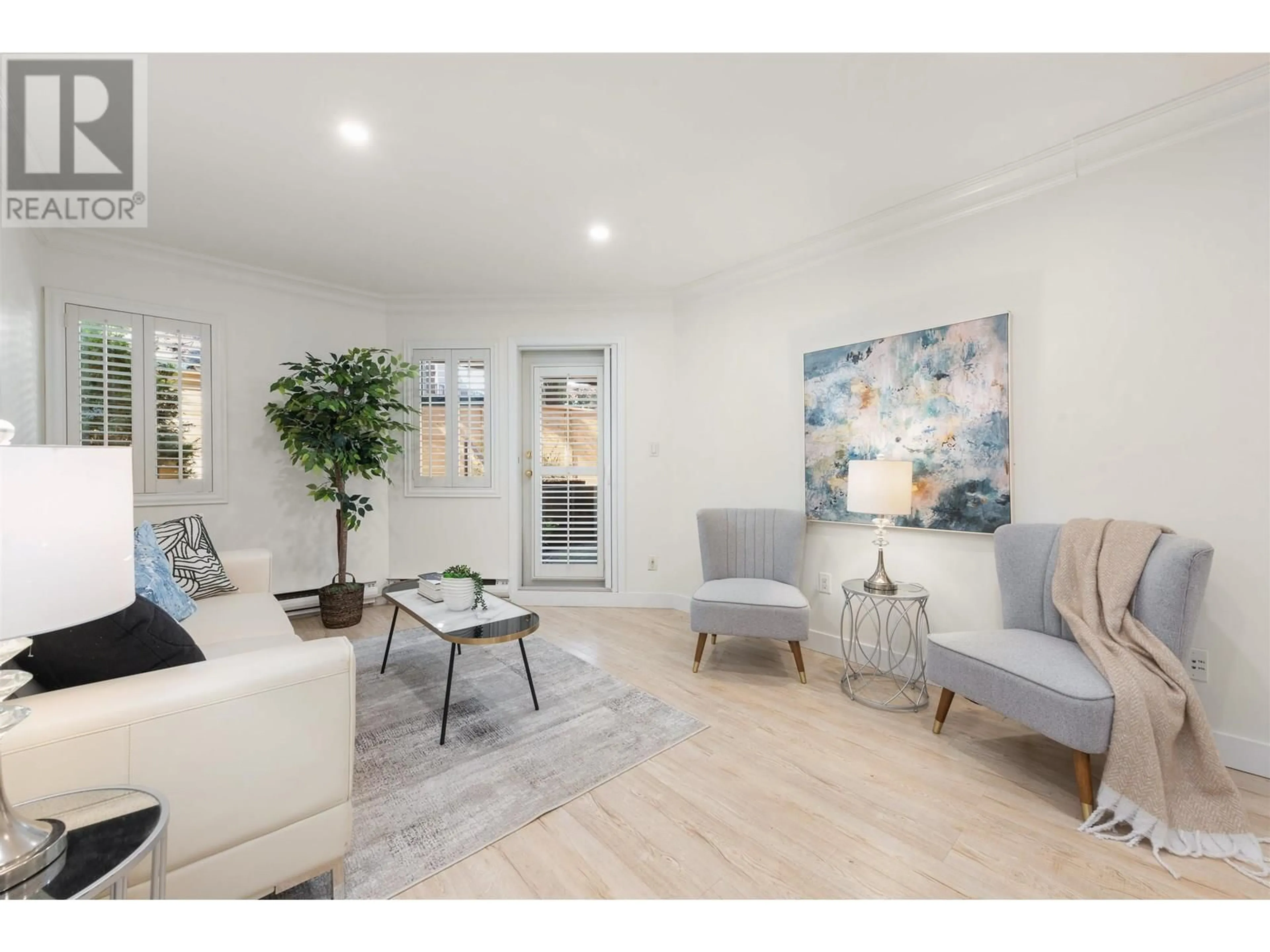 Living room with furniture, wood/laminate floor for 102 - 1476 10TH AVENUE, Vancouver British Columbia V6H1J9