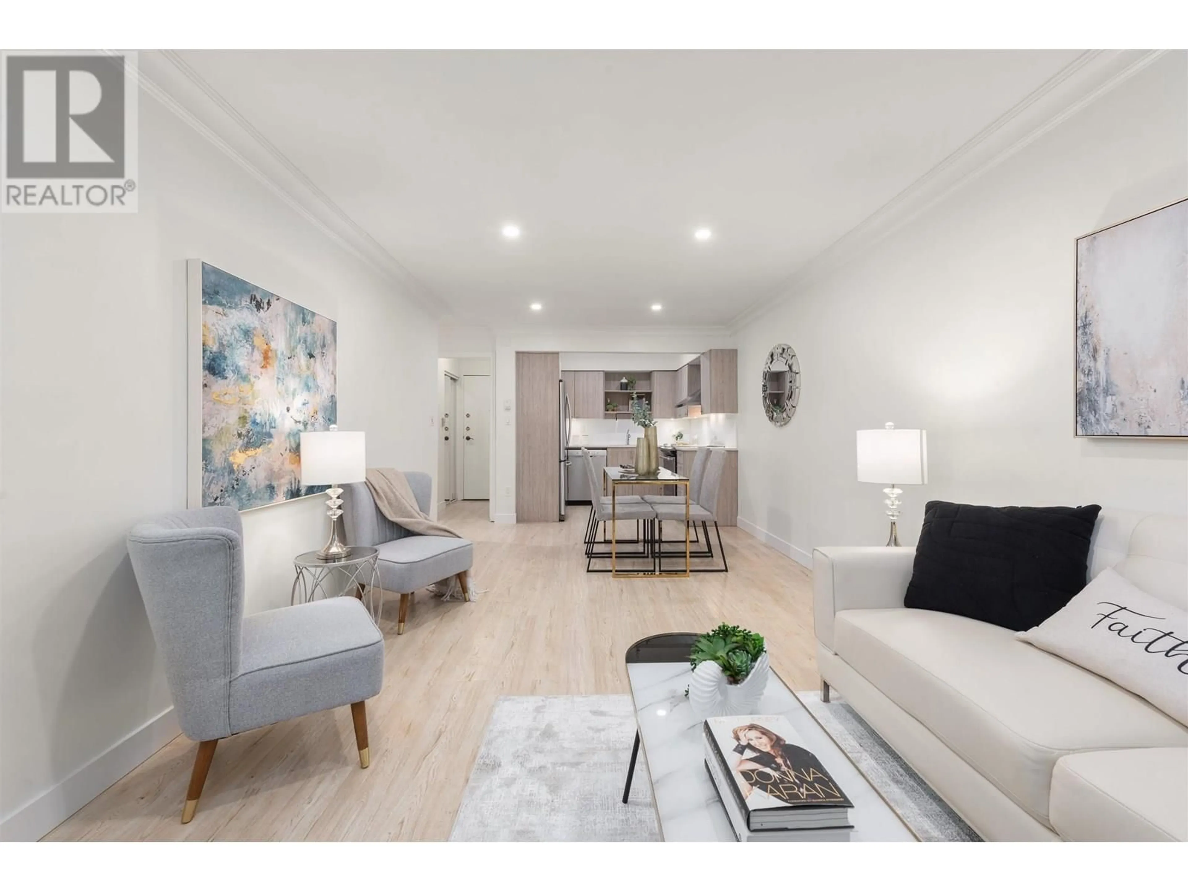 Living room with furniture, wood/laminate floor for 102 - 1476 10TH AVENUE, Vancouver British Columbia V6H1J9