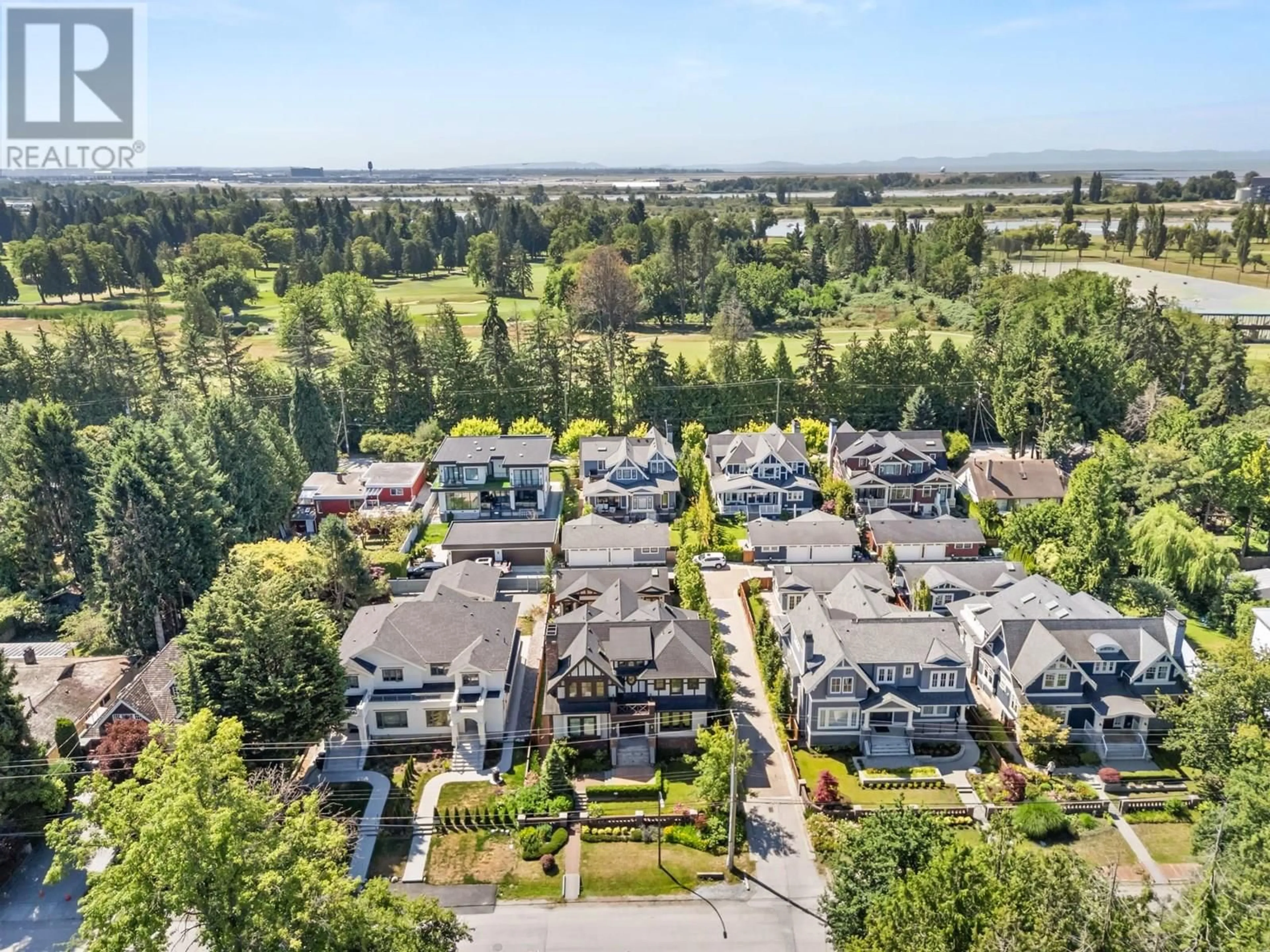 A pic from outside/outdoor area/front of a property/back of a property/a pic from drone, mountain view for 3838 50TH AVENUE, Vancouver British Columbia V6N3V5