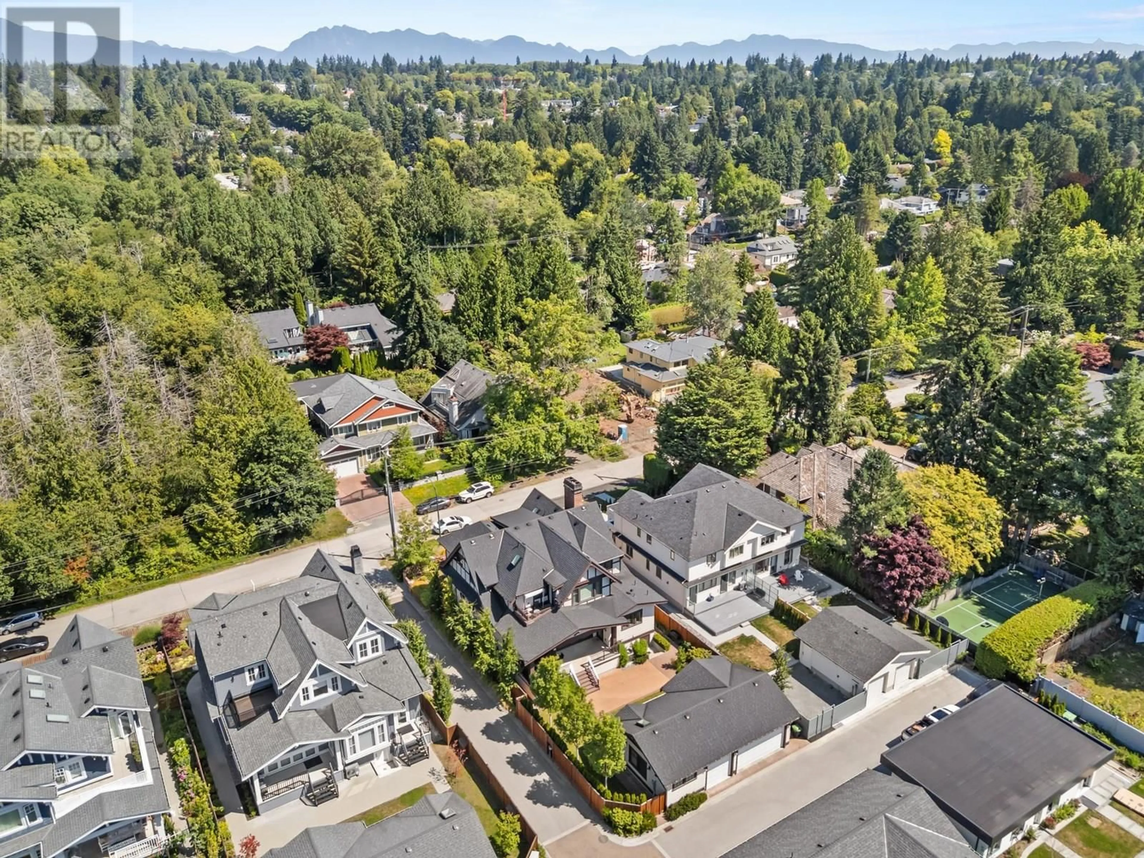 A pic from outside/outdoor area/front of a property/back of a property/a pic from drone, mountain view for 3838 50TH AVENUE, Vancouver British Columbia V6N3V5
