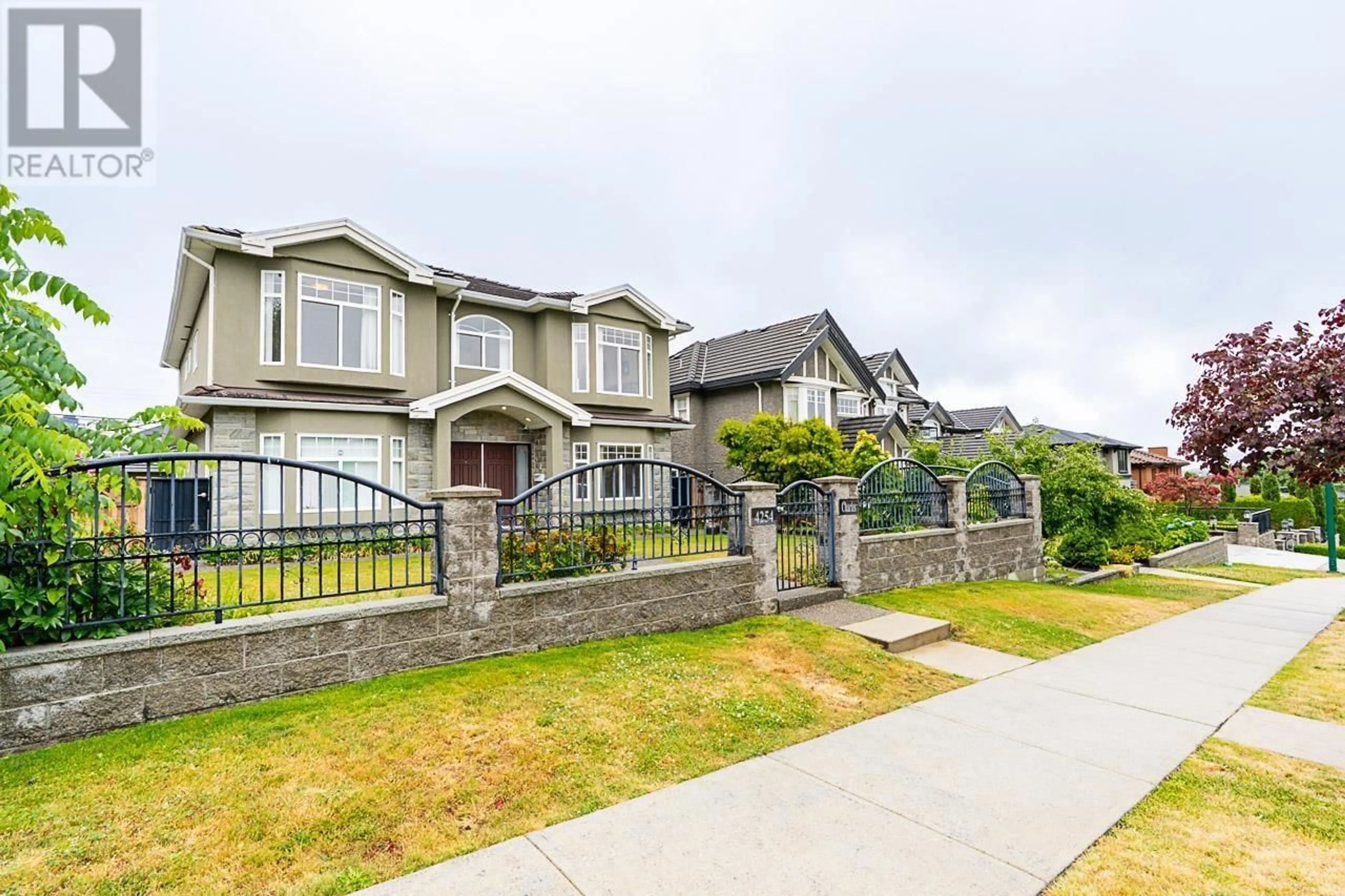 Home with vinyl exterior material, street for 4254 CHARLES STREET, Burnaby British Columbia V5C3K9