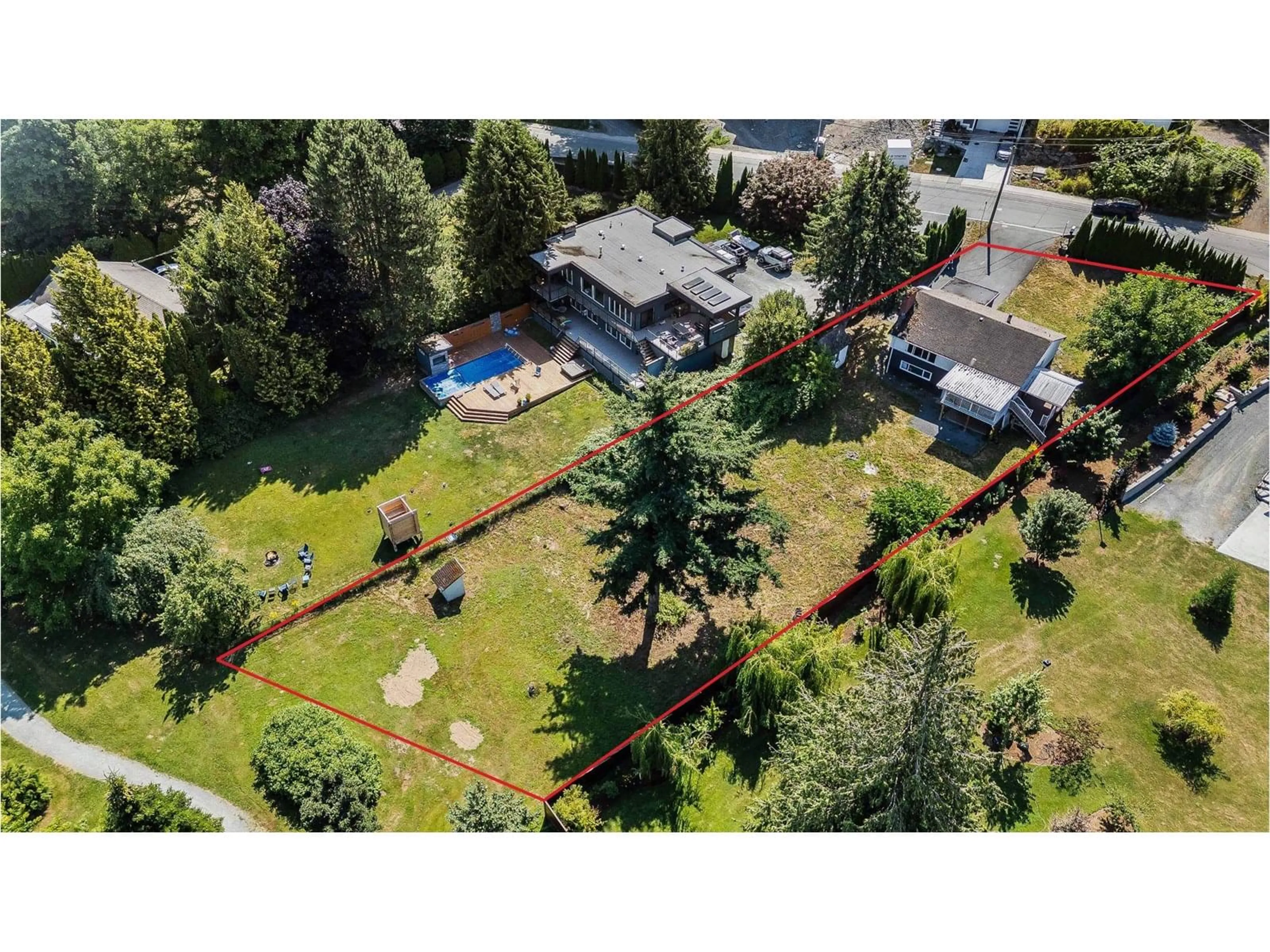 A pic from outside/outdoor area/front of a property/back of a property/a pic from drone, unknown for 5825 JINKERSON ROAD, Chilliwack British Columbia V2R0C8