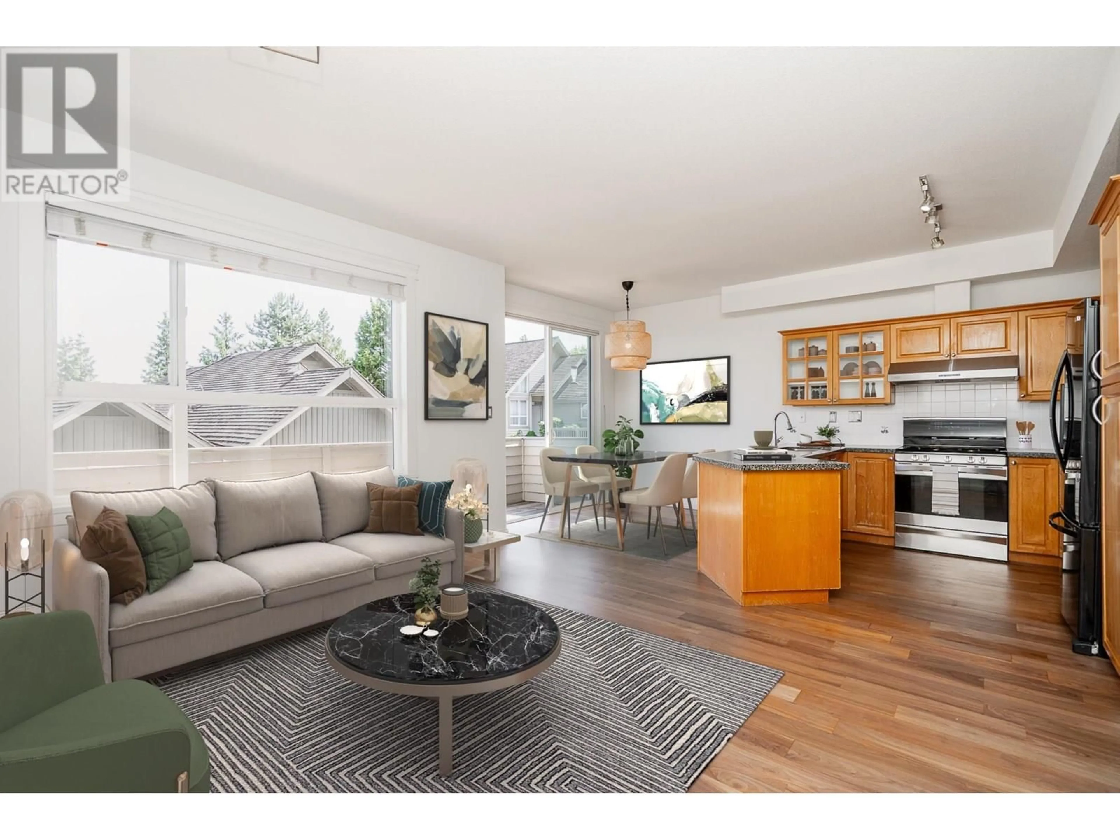 Open concept kitchen, wood/laminate floor for 209 - 1465 PARKWAY BOULEVARD, Coquitlam British Columbia V3E3E6