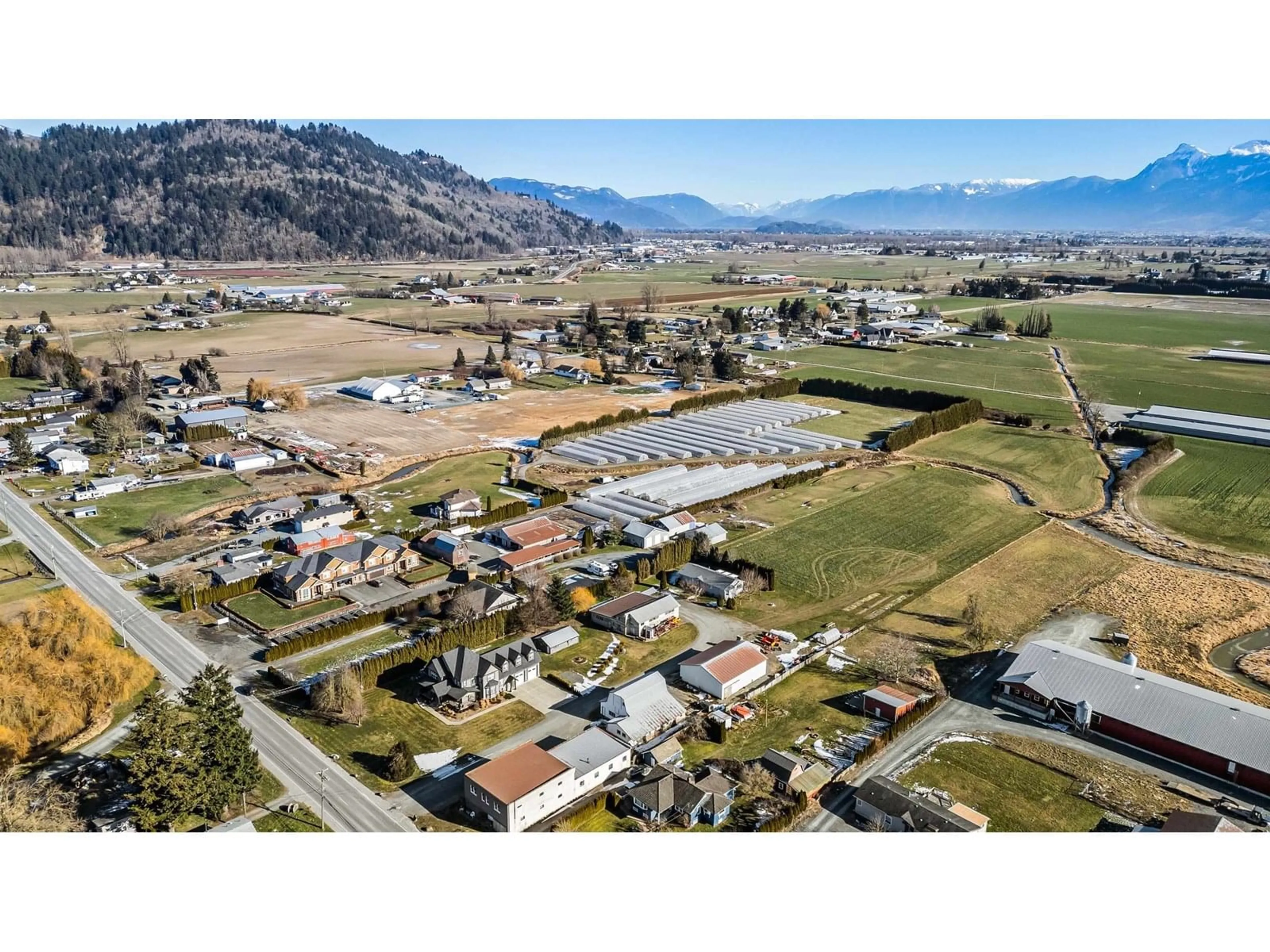 A pic from outside/outdoor area/front of a property/back of a property/a pic from drone, mountain view for 6920 SUMAS PRAIRIE ROAD, Sardis - Greendale British Columbia V2R4K1