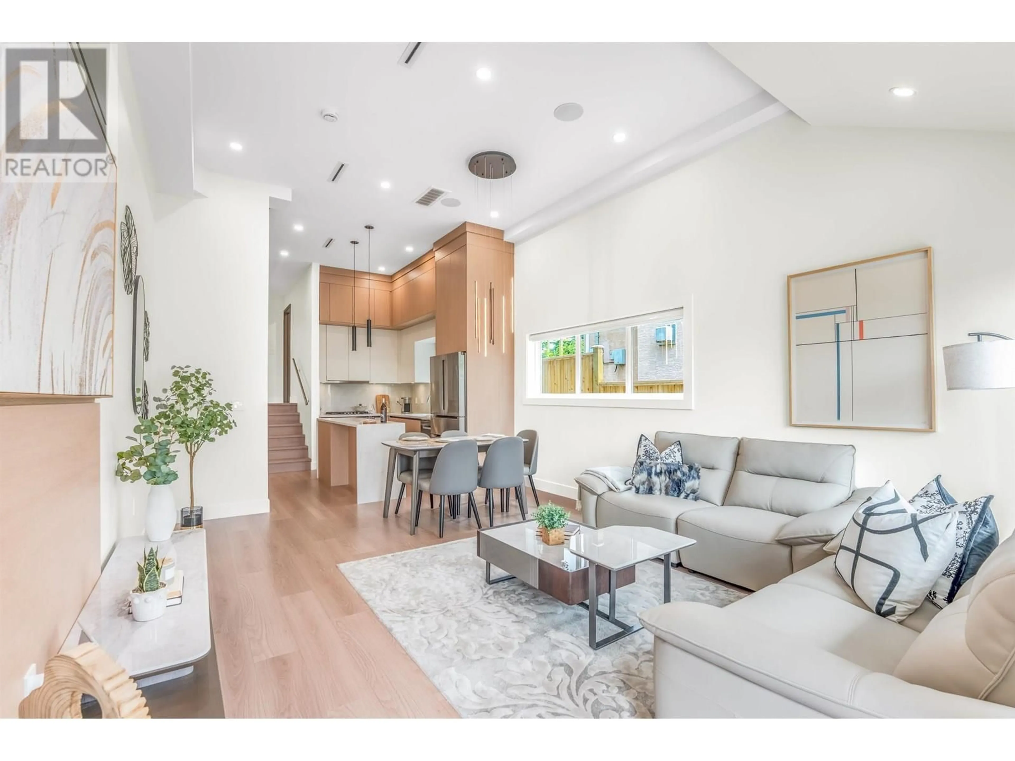 Living room with furniture, wood/laminate floor for 104 - 914 ROCHESTER AVENUE, Coquitlam British Columbia V3K2W6