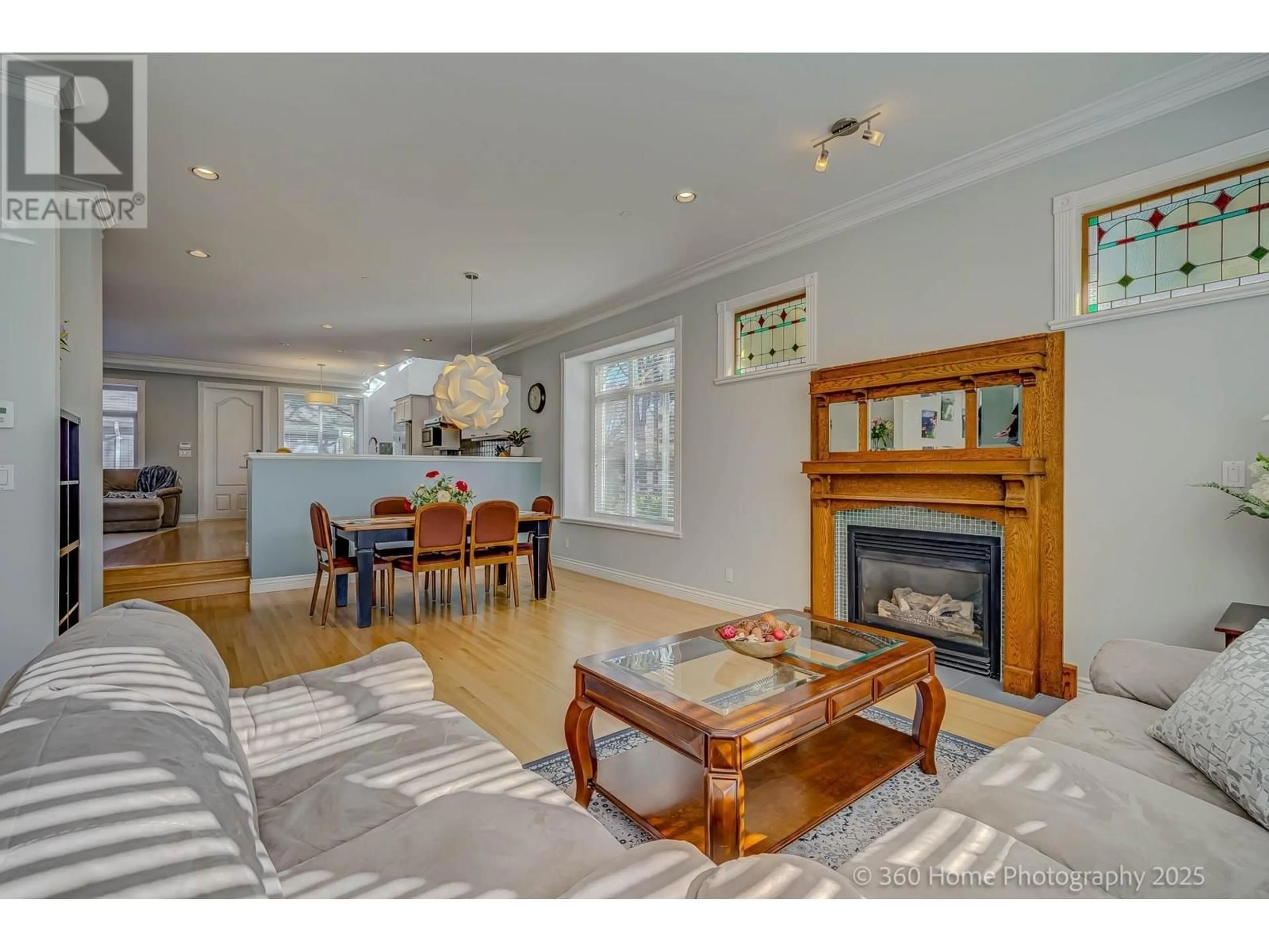 Living room with furniture, wood/laminate floor for 4203 14TH AVENUE, Vancouver British Columbia V6R2X7
