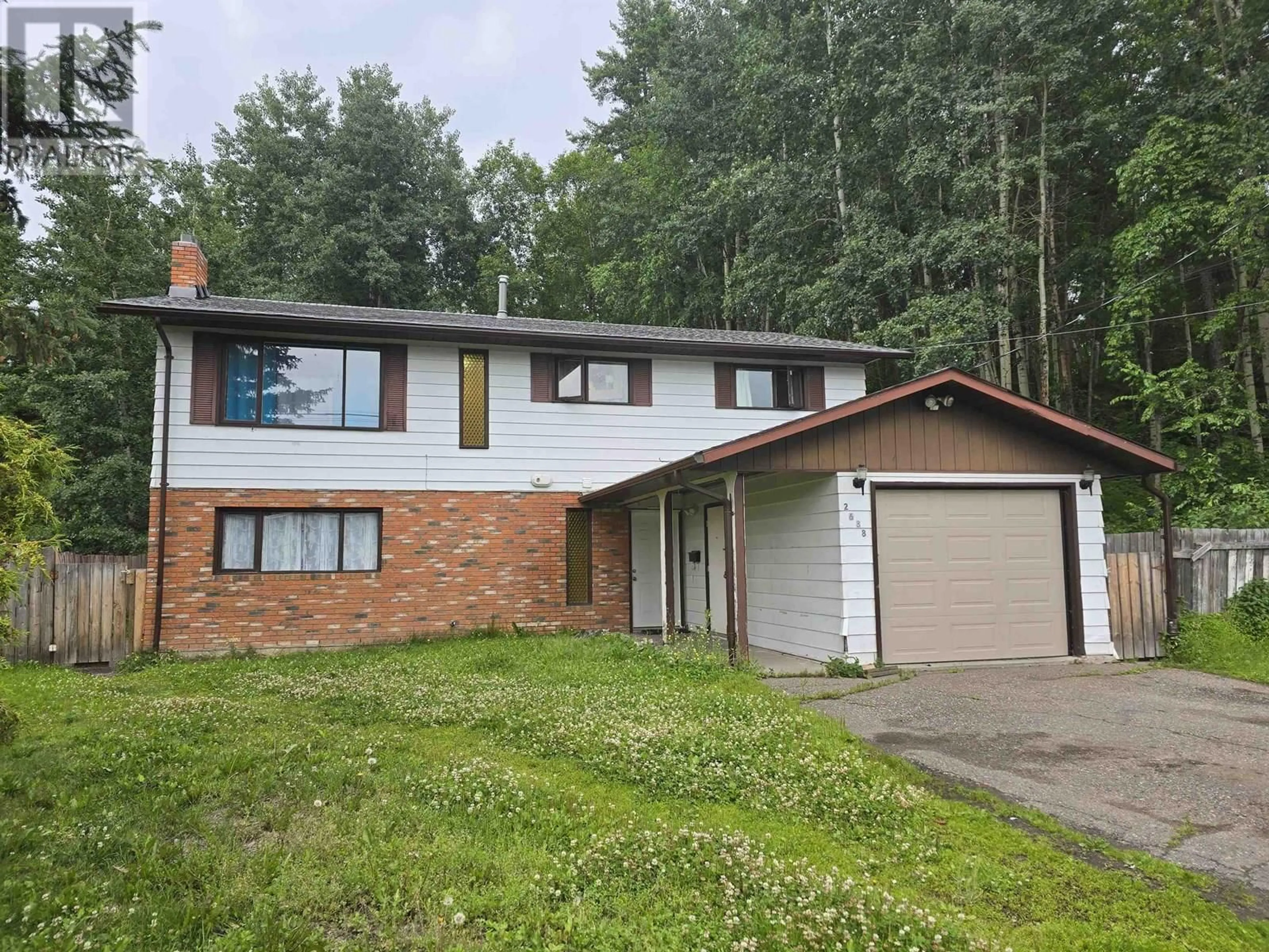 Home with vinyl exterior material, street for 2688 NORWOOD STREET, Prince George British Columbia V2L5L5