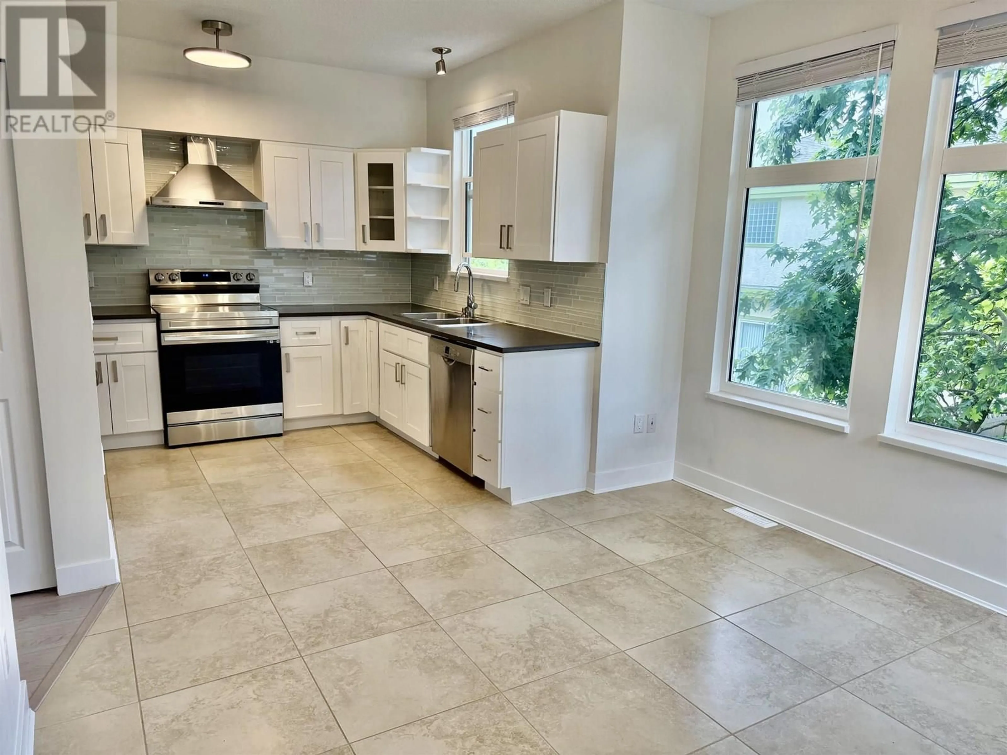 Open concept kitchen, ceramic/tile floor for 35 - 12311 MCNEELY DRIVE, Richmond British Columbia V6V2S2