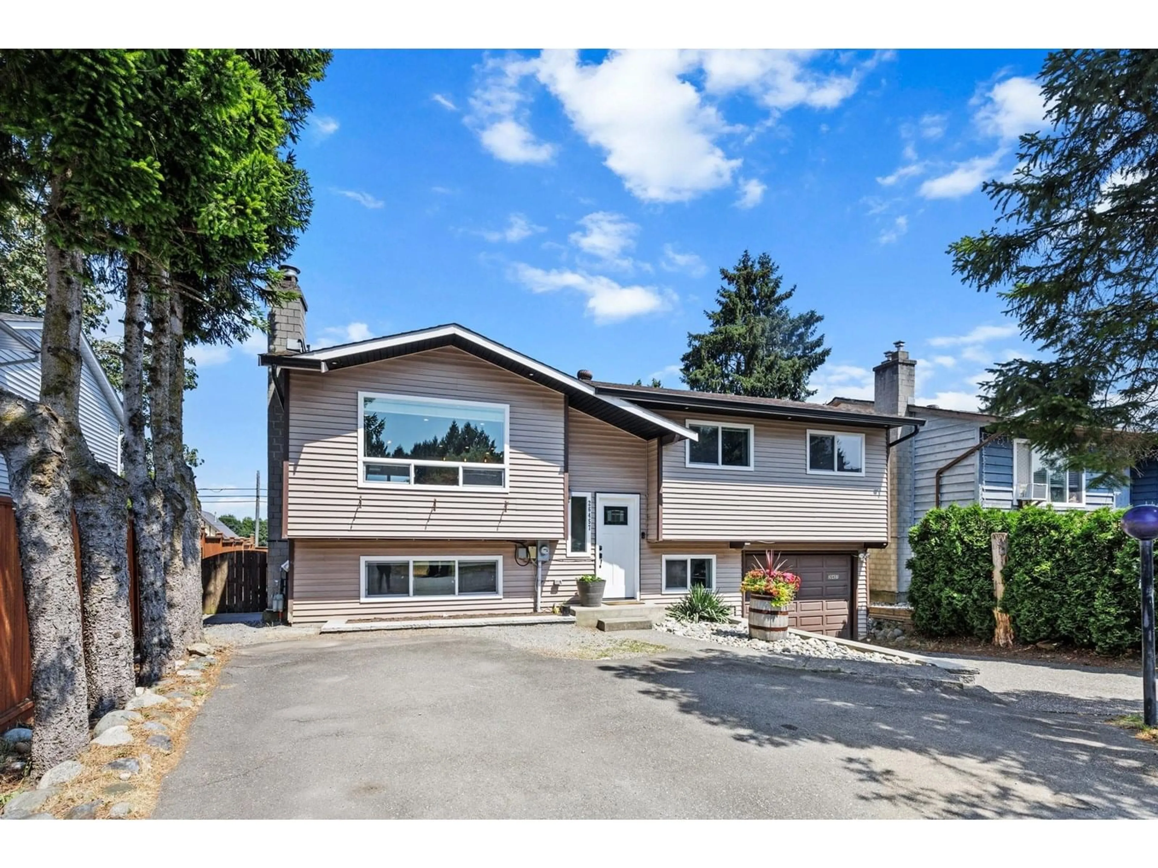 Home with vinyl exterior material, street for 26457 30A, Langley British Columbia V4W3E1