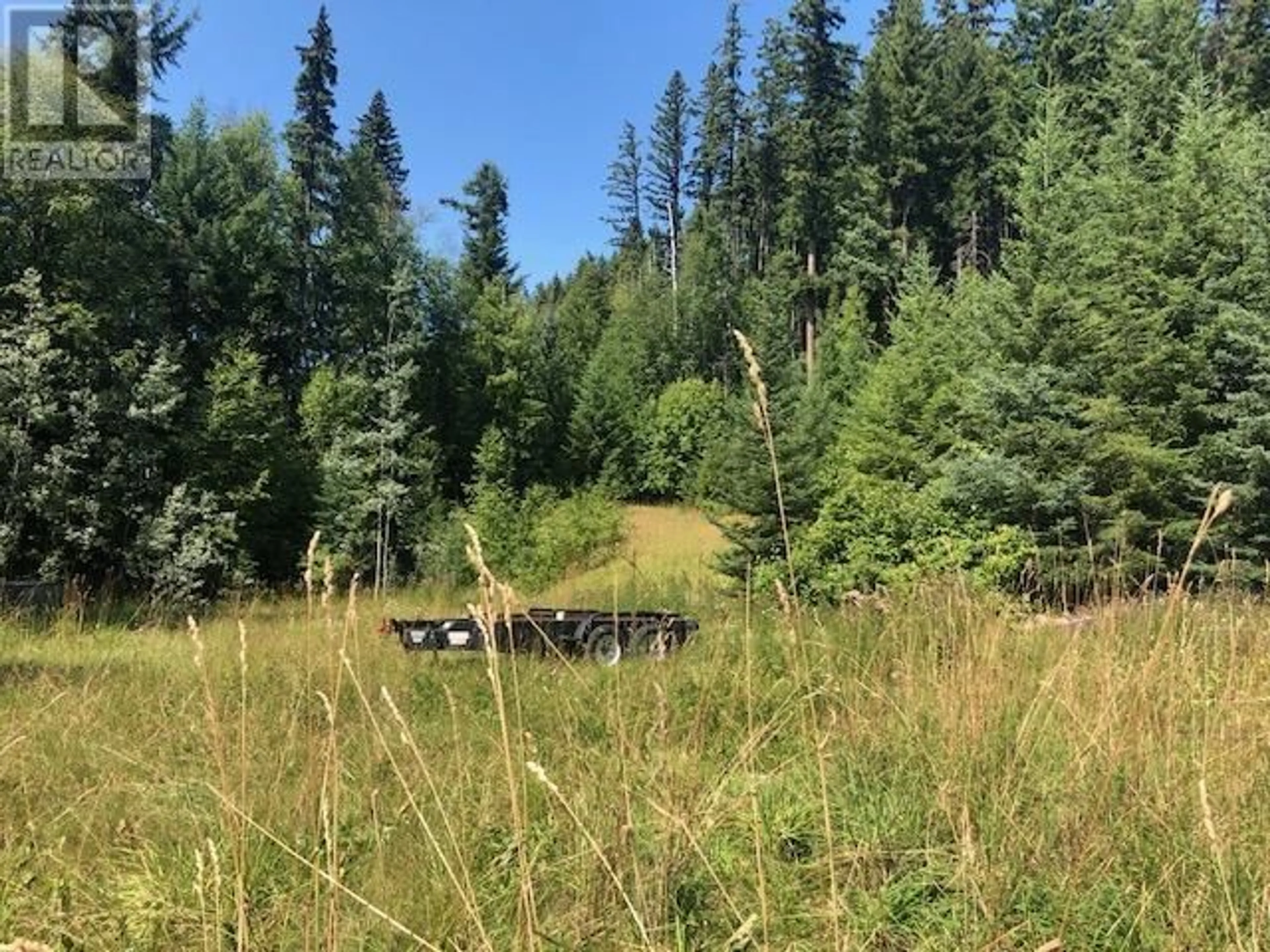 A pic from outside/outdoor area/front of a property/back of a property/a pic from drone, forest/trees view for 6255 SPOONER ROAD, Likely British Columbia V0L1N0