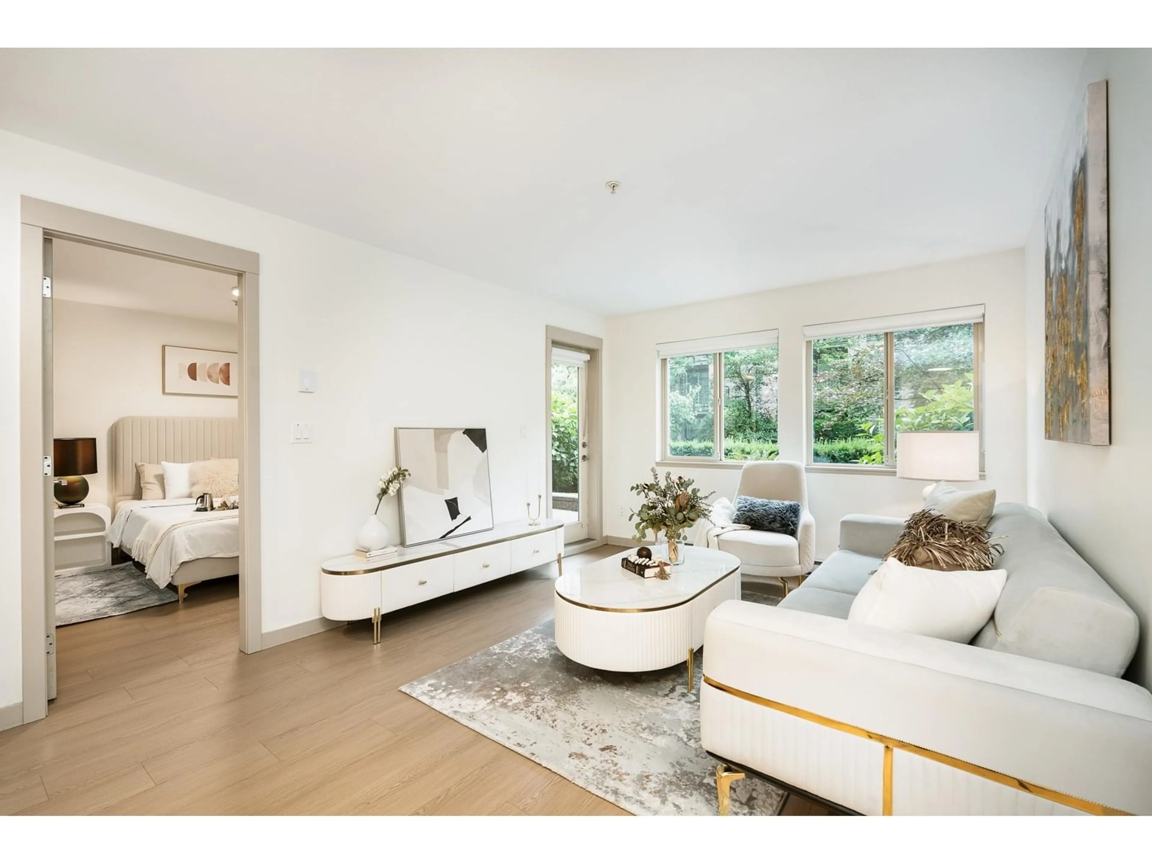 Living room with furniture, wood/laminate floor for 205 - 8695 160, Surrey British Columbia V4N6L6