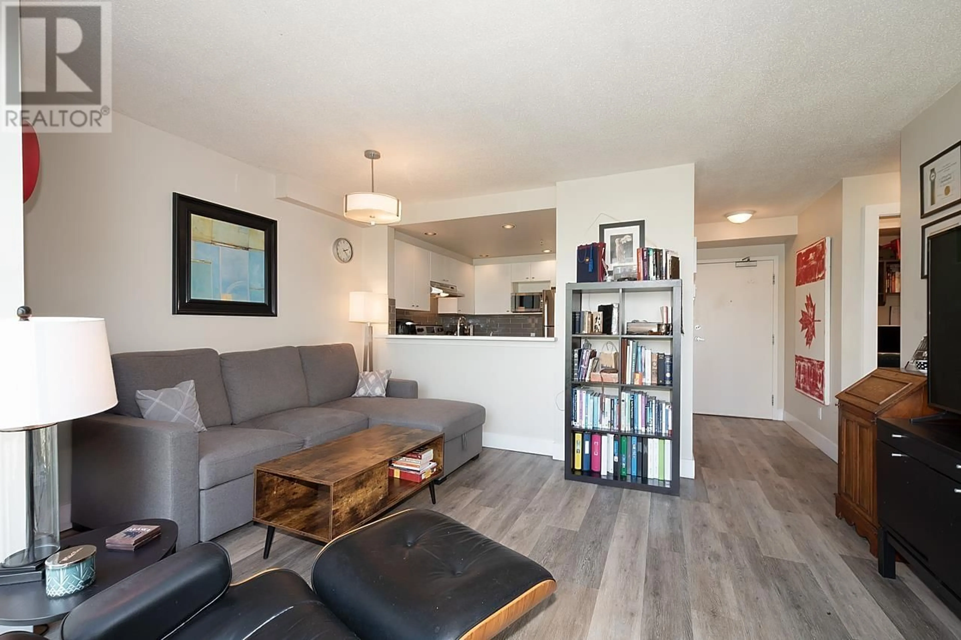 Living room with furniture, wood/laminate floor for 305 - 1688 ROBSON STREET, Vancouver British Columbia V6G1C7