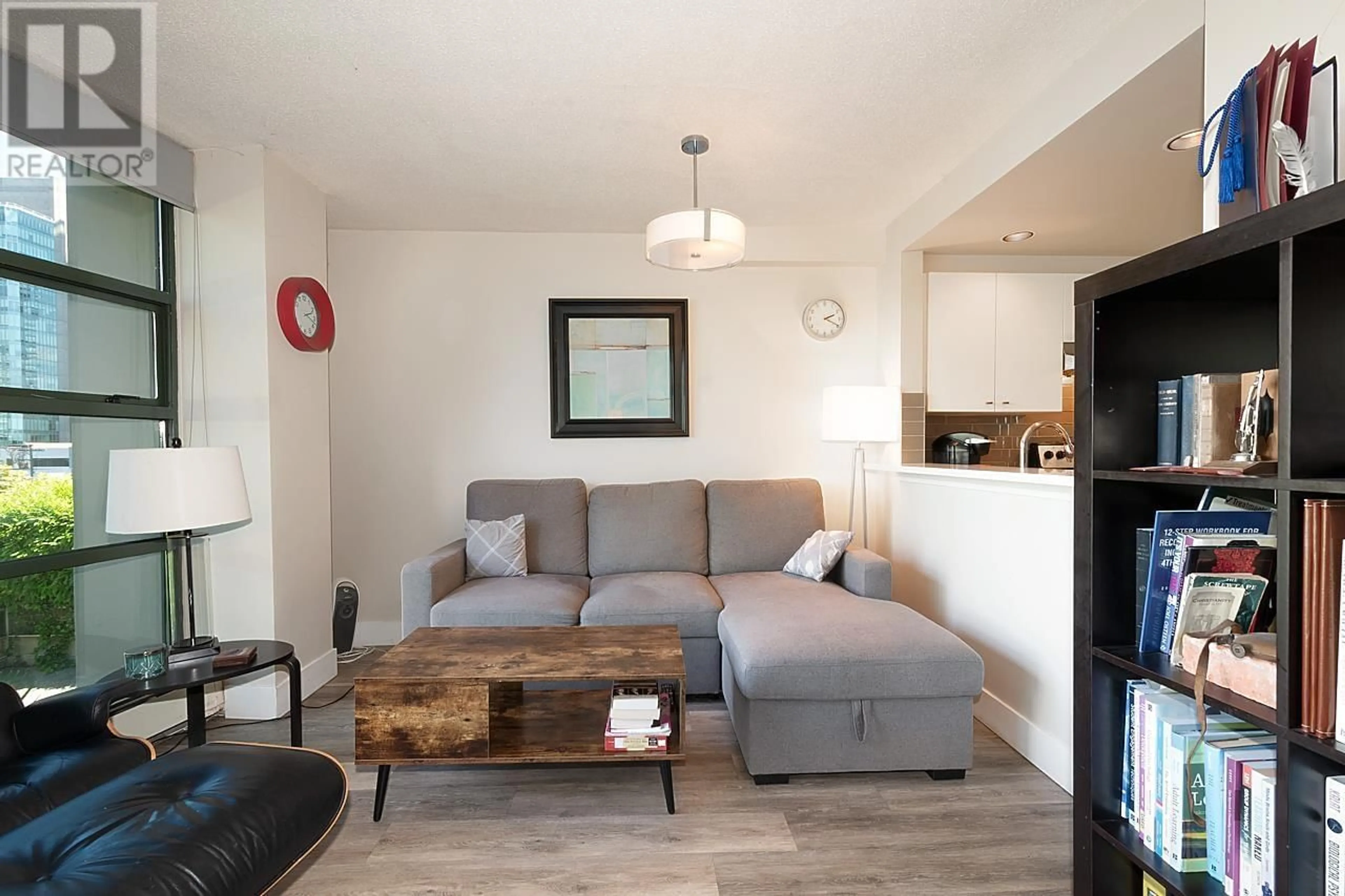 Living room with furniture, wood/laminate floor for 305 - 1688 ROBSON STREET, Vancouver British Columbia V6G1C7
