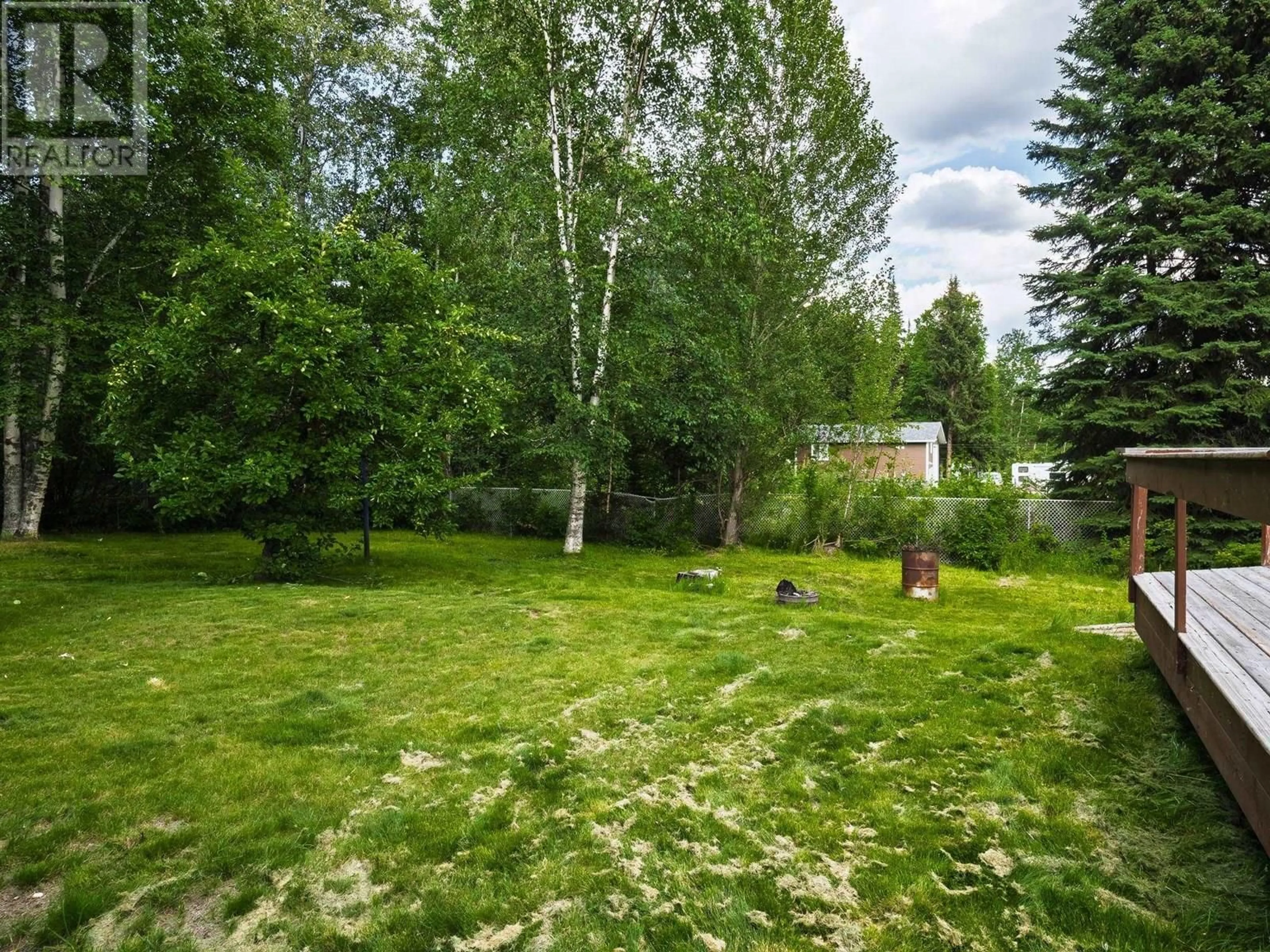 A pic from outside/outdoor area/front of a property/back of a property/a pic from drone, forest/trees view for 4334 CHESTNUT DRIVE, Prince George British Columbia V2K2T5
