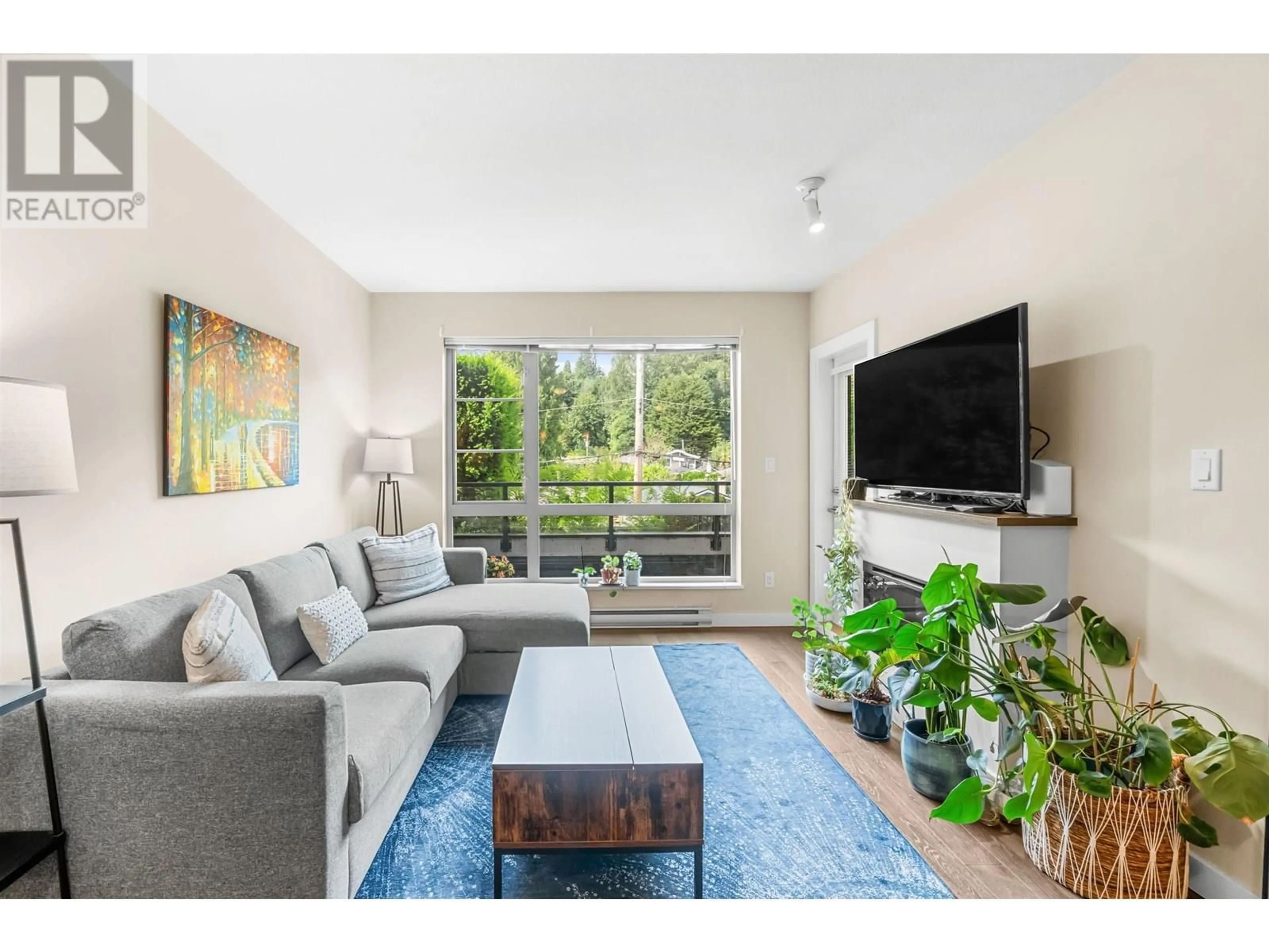 Living room with furniture, unknown for 215 - 1330 MARINE DRIVE, North Vancouver British Columbia V7P1T4