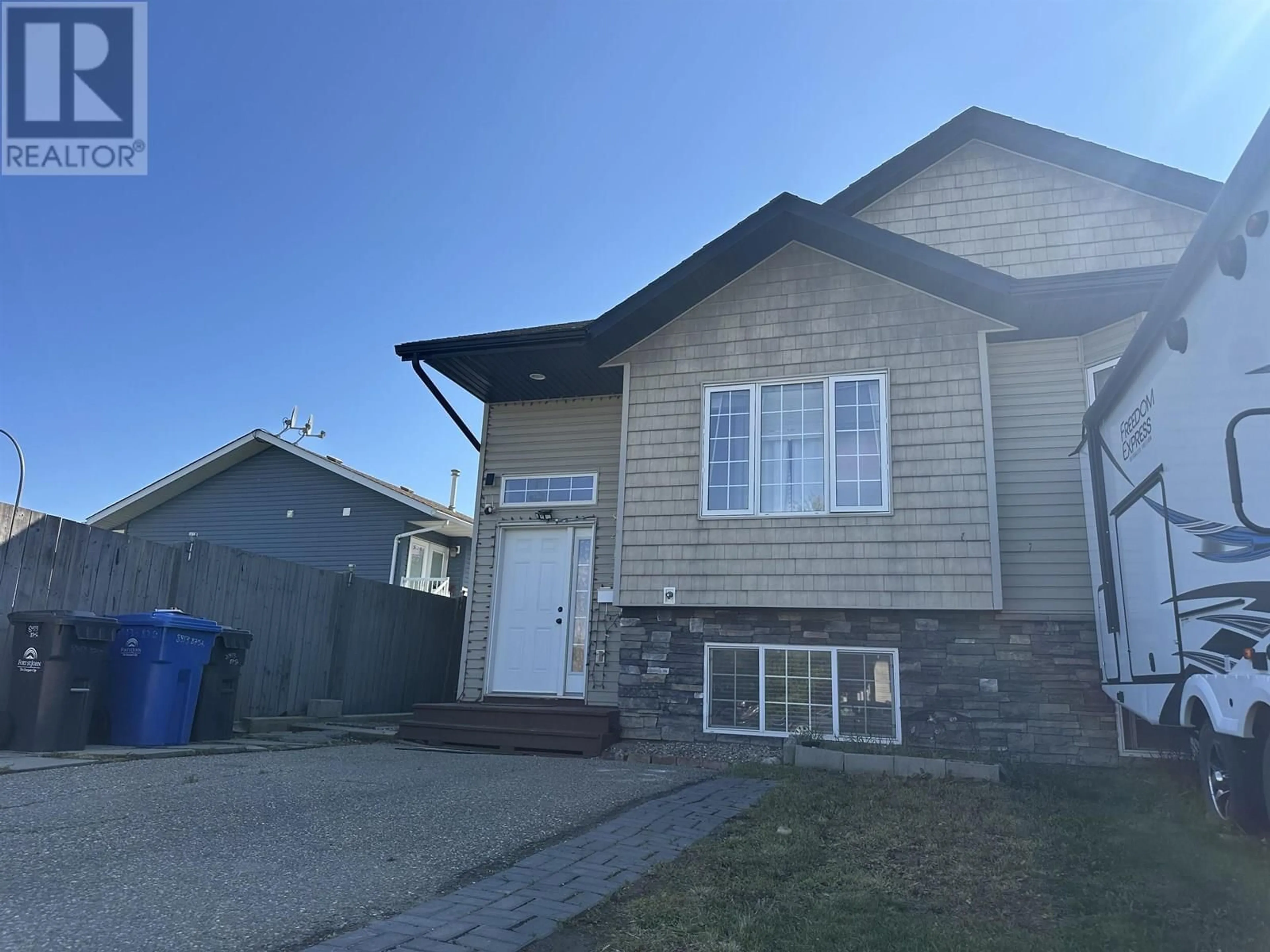 Home with vinyl exterior material, street for 8413 87 STREET, Fort St. John British Columbia V1J0H4