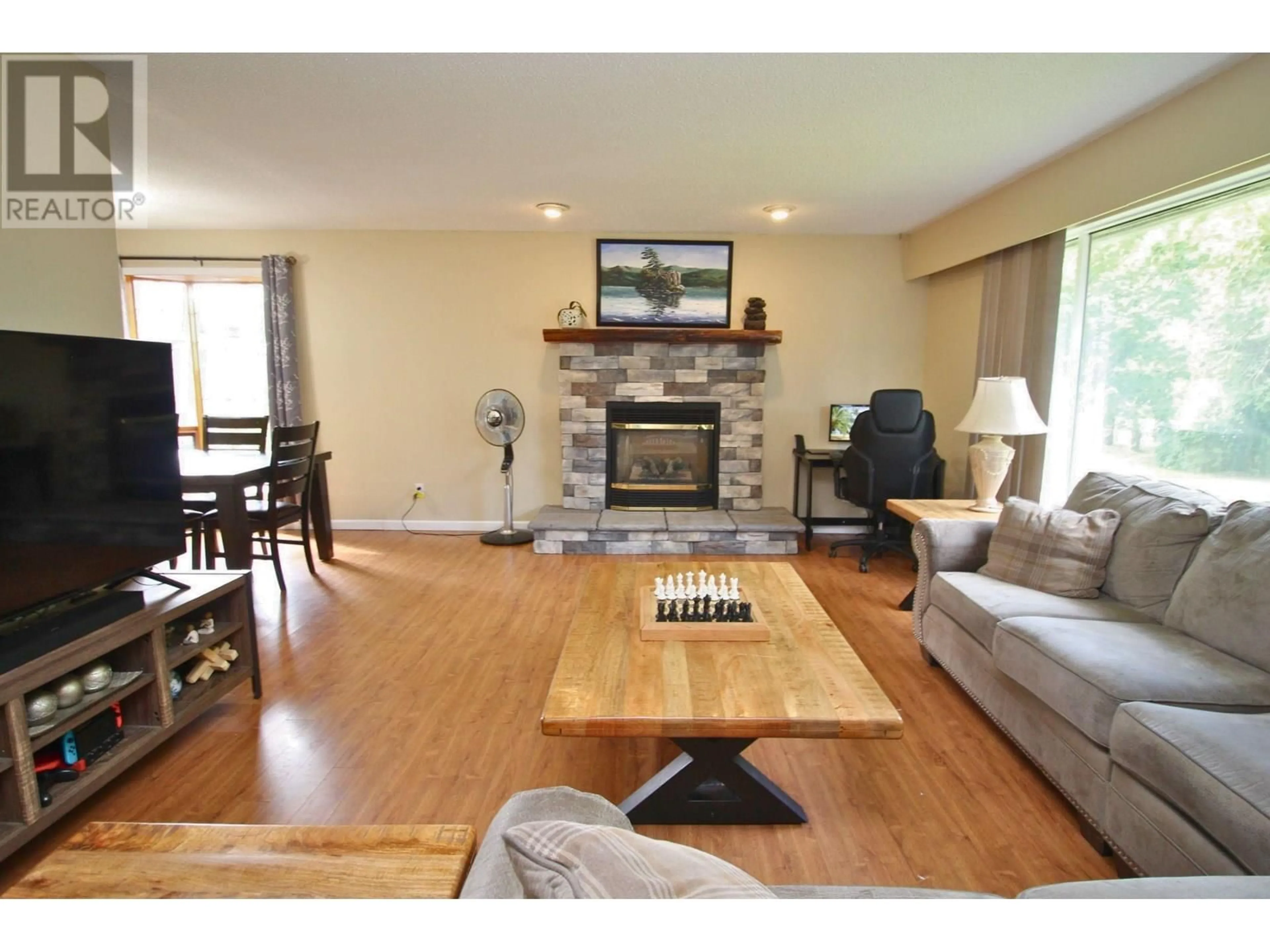 Living room with furniture, wood/laminate floor for 2566 AVALON AVENUE, Houston British Columbia V0J1Z2