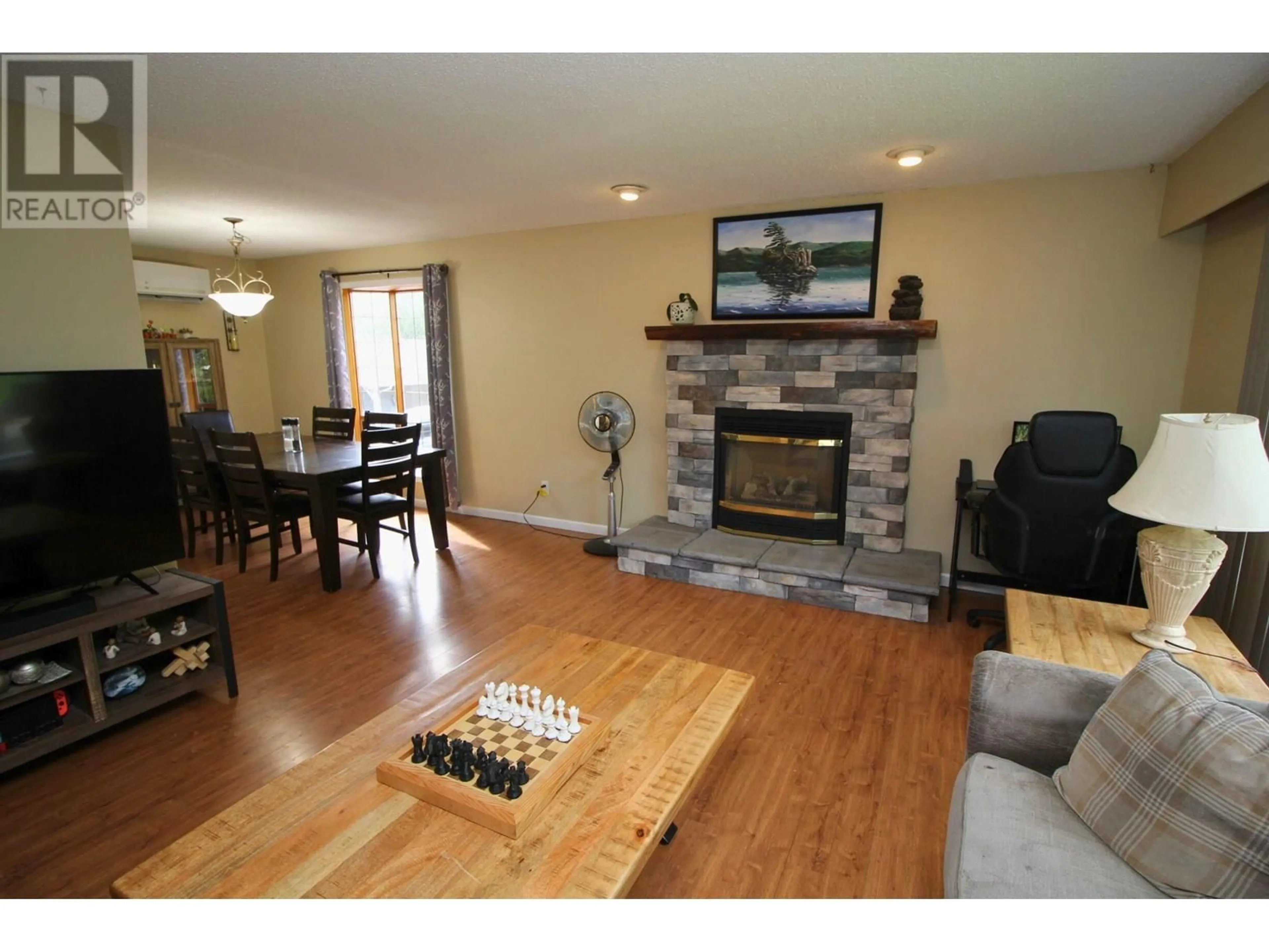 Living room with furniture, wood/laminate floor for 2566 AVALON AVENUE, Houston British Columbia V0J1Z2
