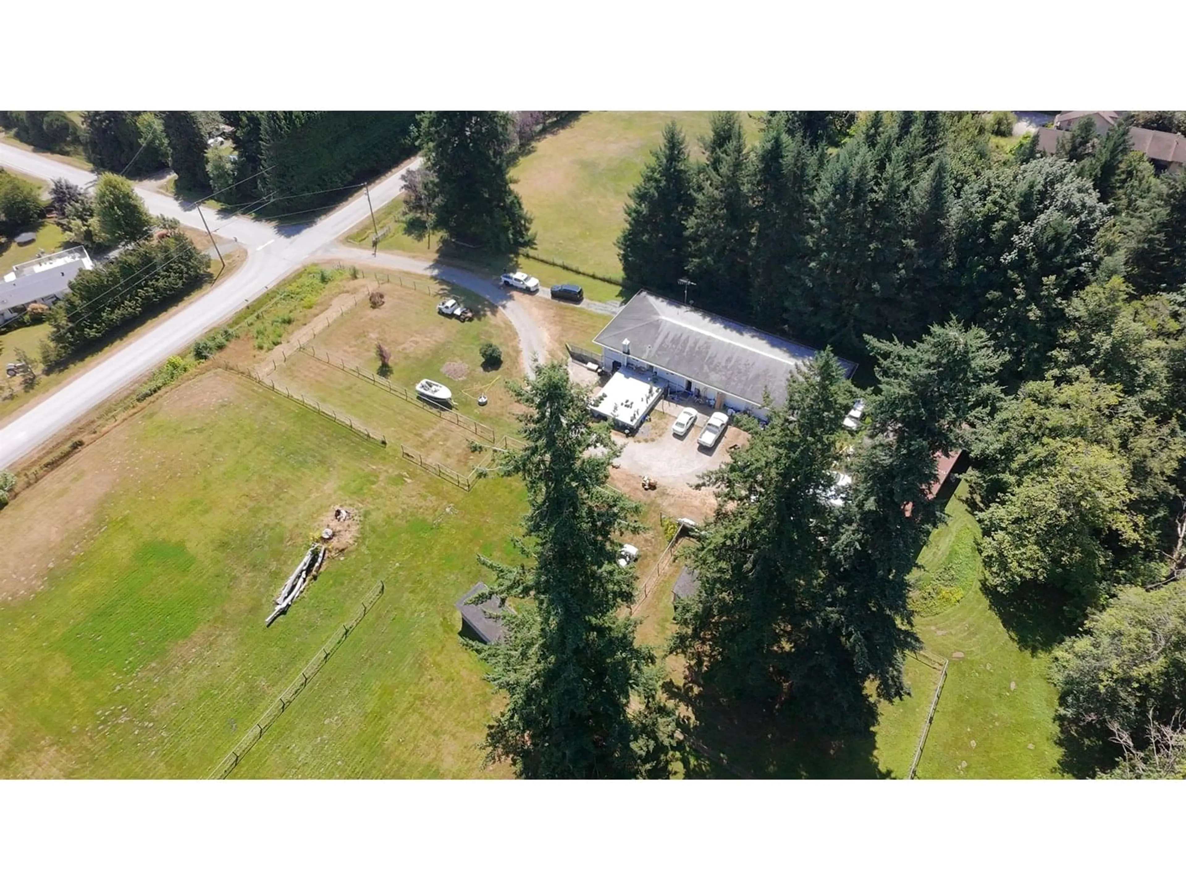 A pic from outside/outdoor area/front of a property/back of a property/a pic from drone, unknown for 1405 227, Langley British Columbia V2Z1K6