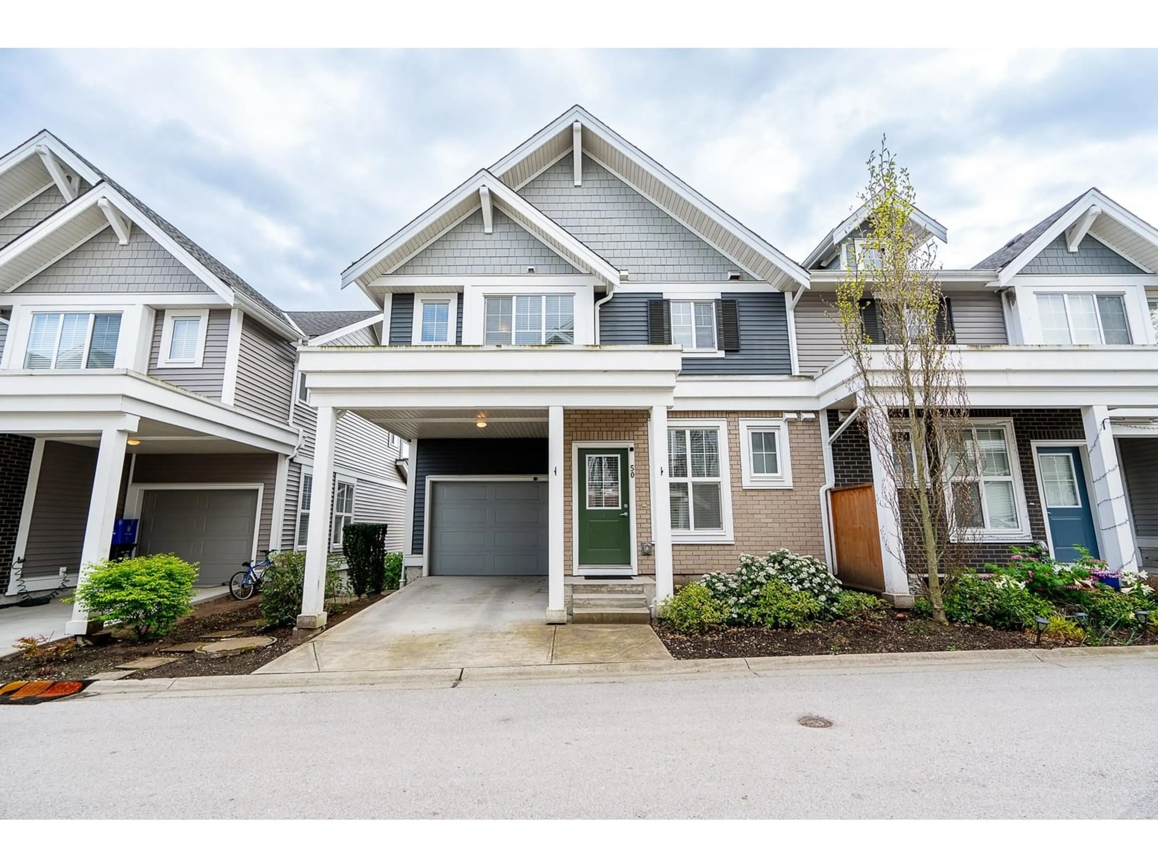 Home with vinyl exterior material, street for 50 - 7169 208A, Langley British Columbia V2Y0X2