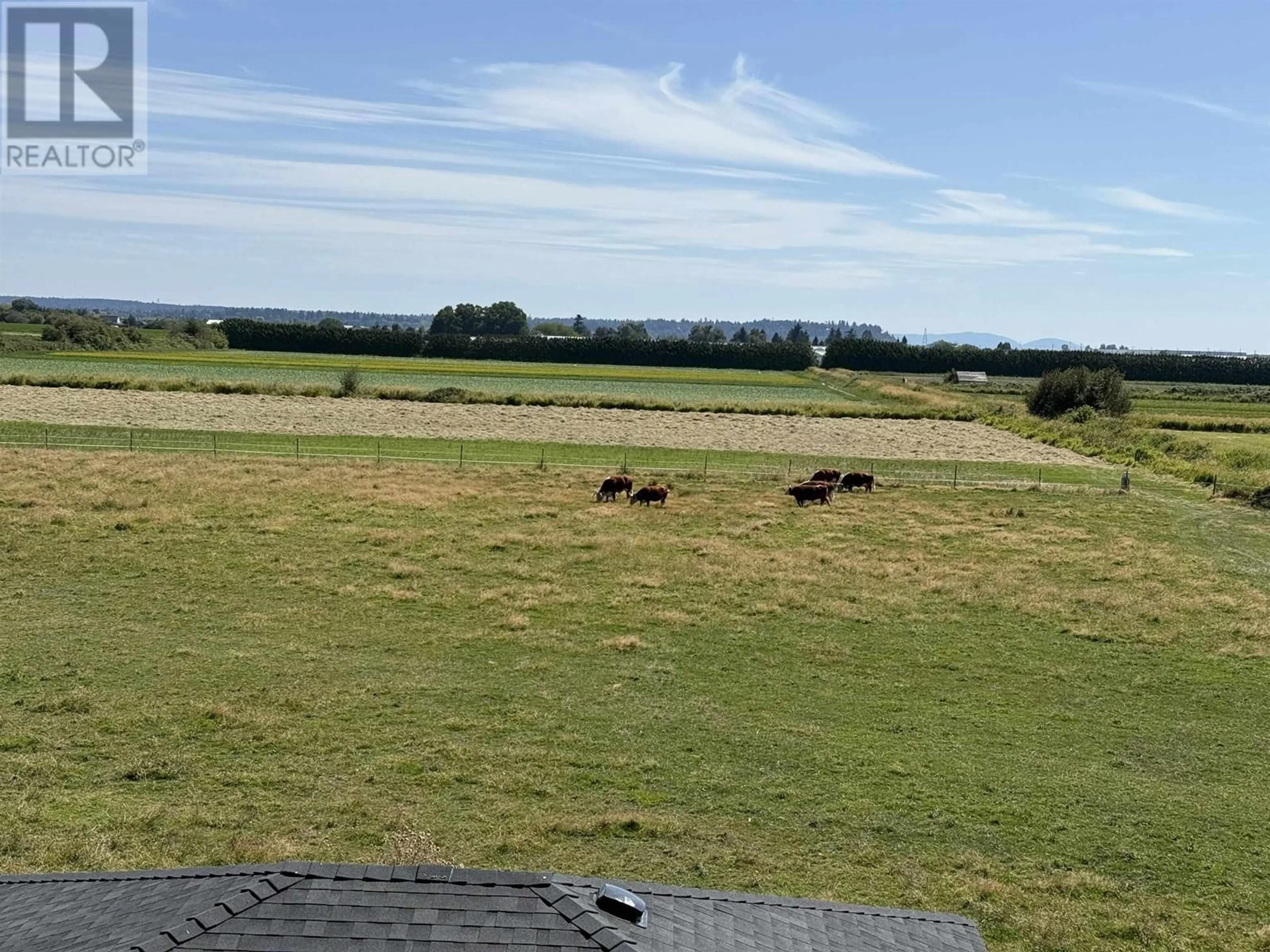 A pic from outside/outdoor area/front of a property/back of a property/a pic from drone, mountain view for 1 - 4818 42A AVENUE, Delta British Columbia V4K1A1