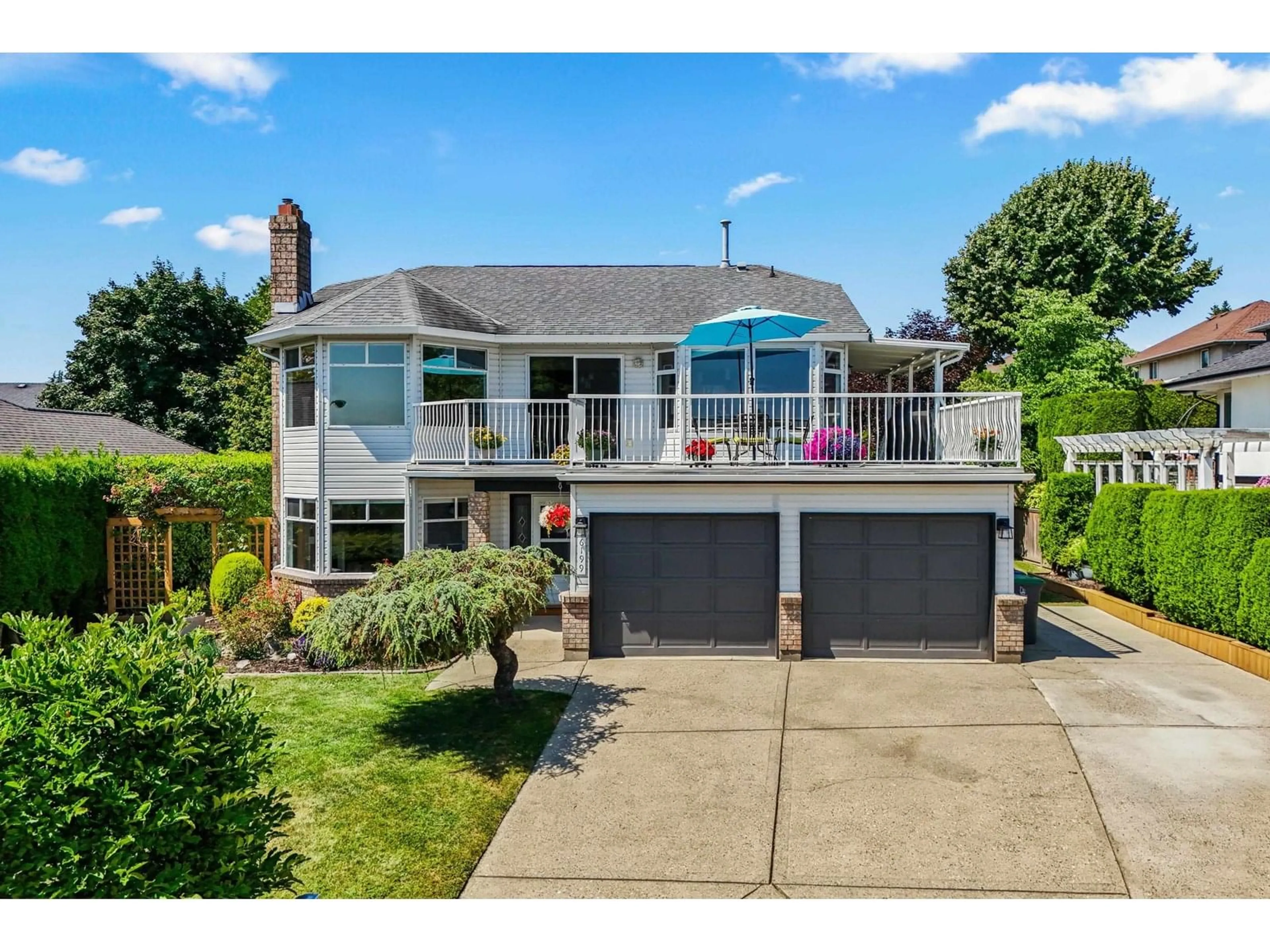A pic from outside/outdoor area/front of a property/back of a property/a pic from drone, unknown for 6199 191A, Surrey British Columbia V2S8C7