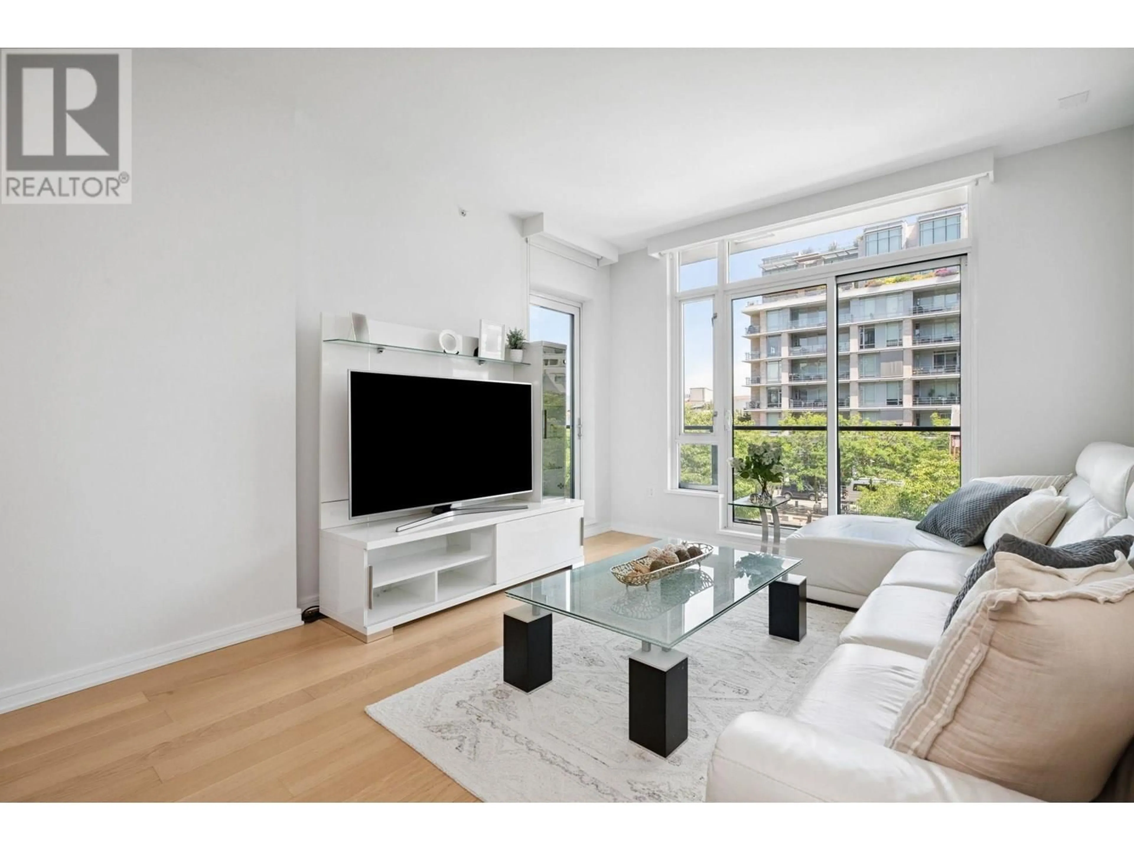 Living room with furniture, unknown for 302 - 1625 MANITOBA STREET, Vancouver British Columbia V5Y0B8