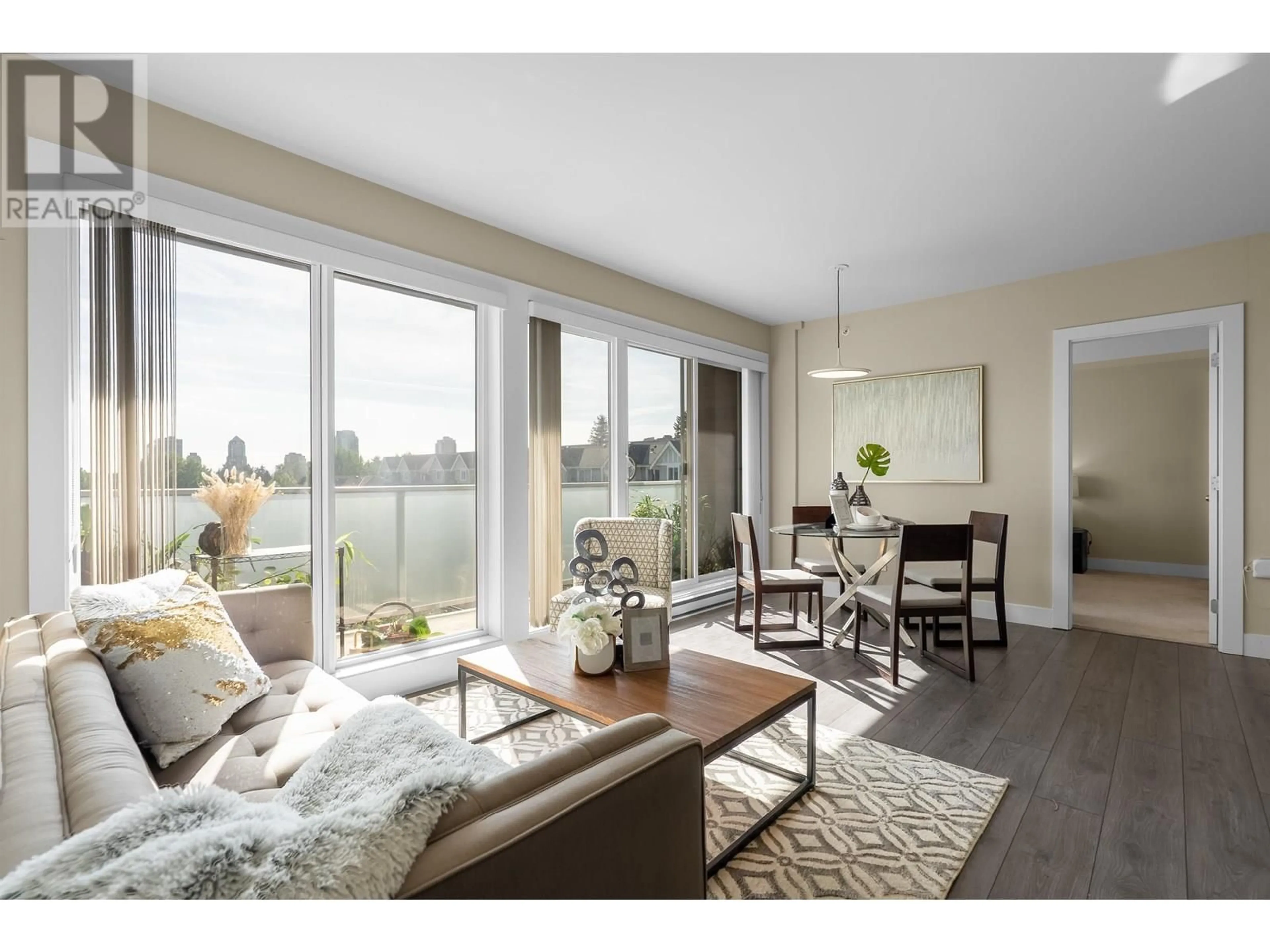 Living room with furniture, wood/laminate floor for 302 - 7377 14TH AVENUE, Burnaby British Columbia V3N1Z7